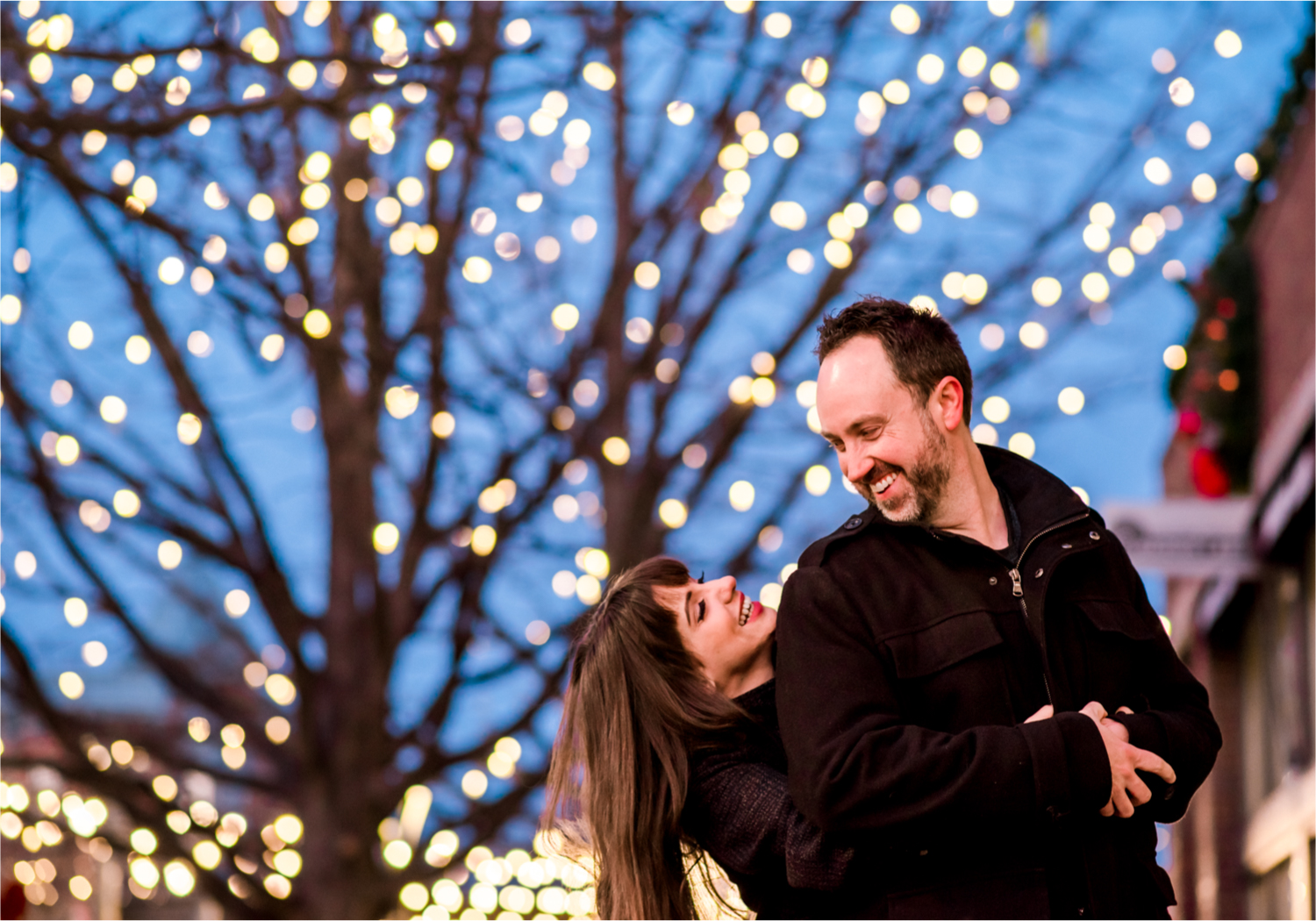 Snowy Winter Engagement in Old Town Fort Collins with twinkle lights | Britni Girard Photography, Colorado Wedding Photographer