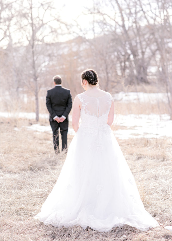 Winter Wedding in Fort Collins with a First Look at Spring Canyon and a romantic church ceremony | Britni Girard Photography | Colorado Wedding Photographer