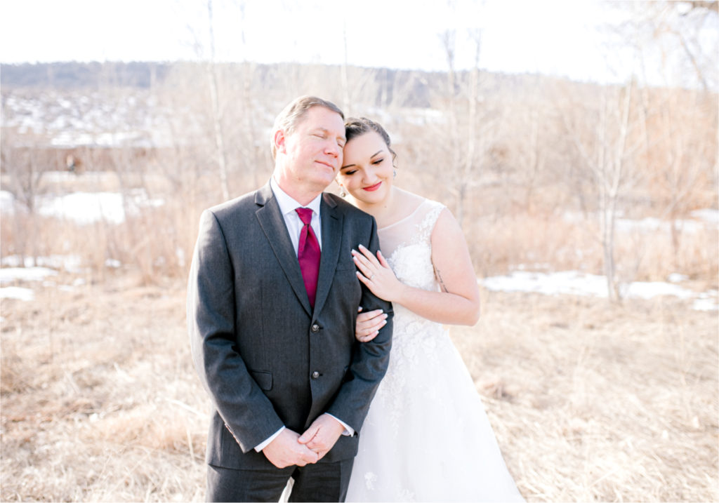 Winter Wedding in Fort Collins with a First Look at Spring Canyon and a romantic church ceremony | Britni Girard Photography | Colorado Wedding Photographer
