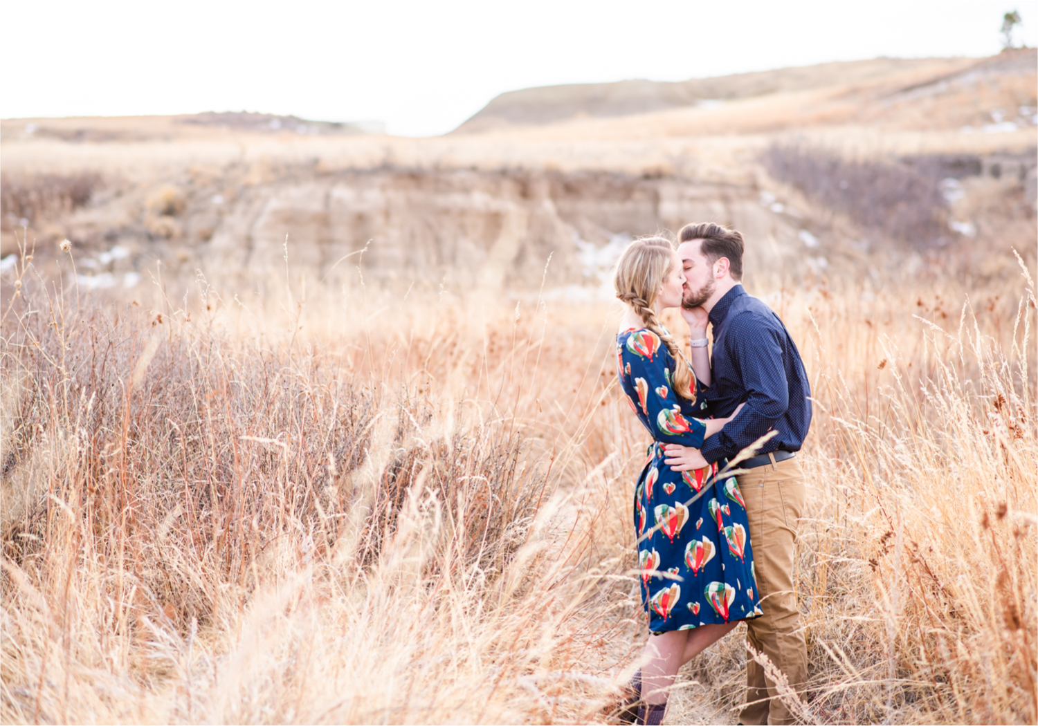 Engagement at Colorado Paint Mines in Calhan, Colorado near Colorado Springs | Britni Girard Photography Colorado Wedding Photographer, adventure engagement session with whimsical charm for two newly engaged artists | Sunset Engagement at Paint Mines