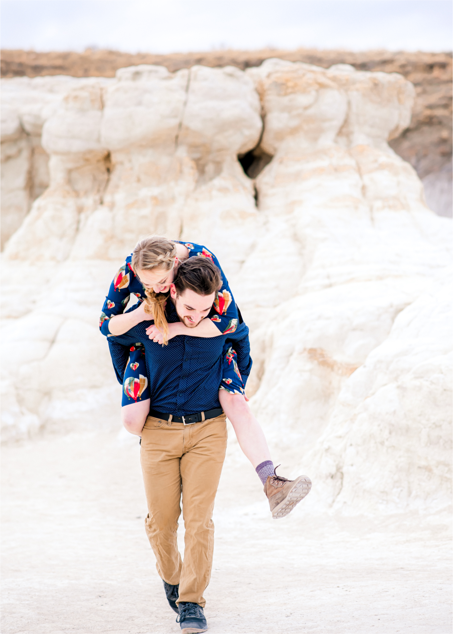 Engagement at Colorado Paint Mines in Calhan, Colorado near Colorado Springs | Britni Girard Photography Colorado Wedding Photographer, adventure engagement session with whimsical charm for two newly engaged artists | Sunset Engagement at Paint Mines