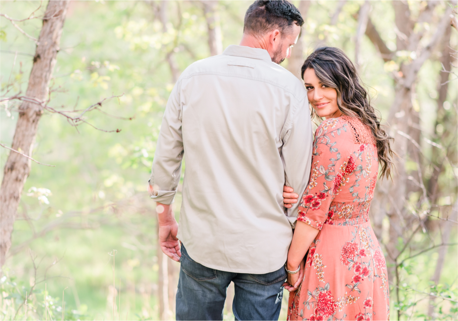 Romantic Summer Engagement at Red Rock Canyon Park in Colorado Springs | Britni Girard Photography Colorado Wedding Photographer and Videographer | Floral Dress, Green Dress, Grassy Fields, Rustic Boho Engagement