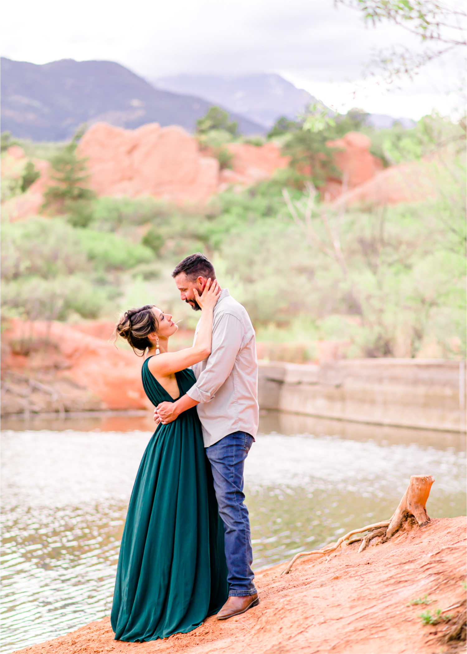Romantic Summer Engagement at Red Rock Canyon Park in Colorado Springs | Britni Girard Photography Colorado Wedding Photographer and Videographer | Floral Dress, Green Dress, Grassy Fields, Rustic Boho Engagement