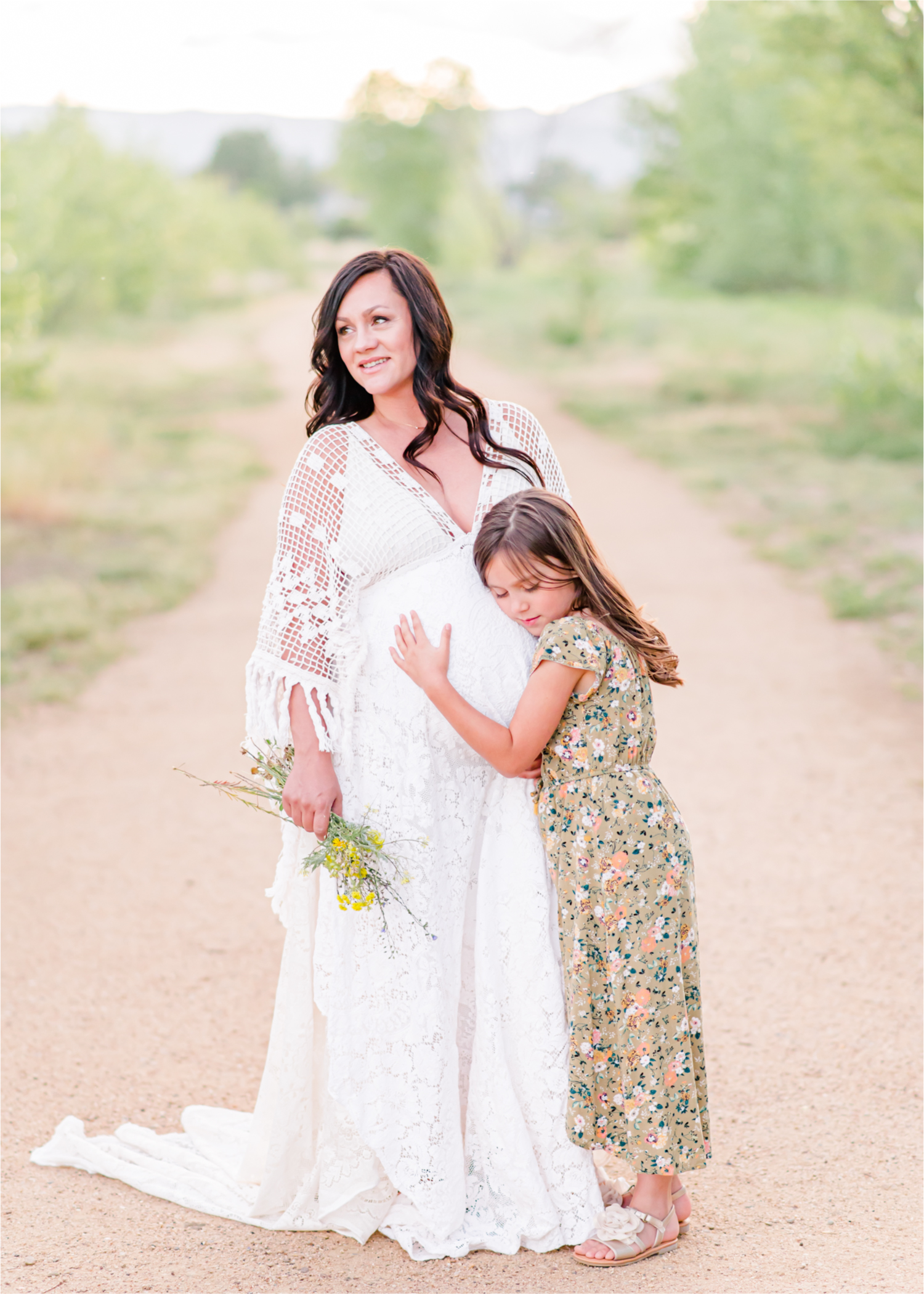 Spring Maternity Session in Loveland Colorado | Britni Girard Photography | Romantic Boho Inspired Maternity Session with Reclamation Dress at River's Edge | Colorado Wedding and Lifestyle Photographer