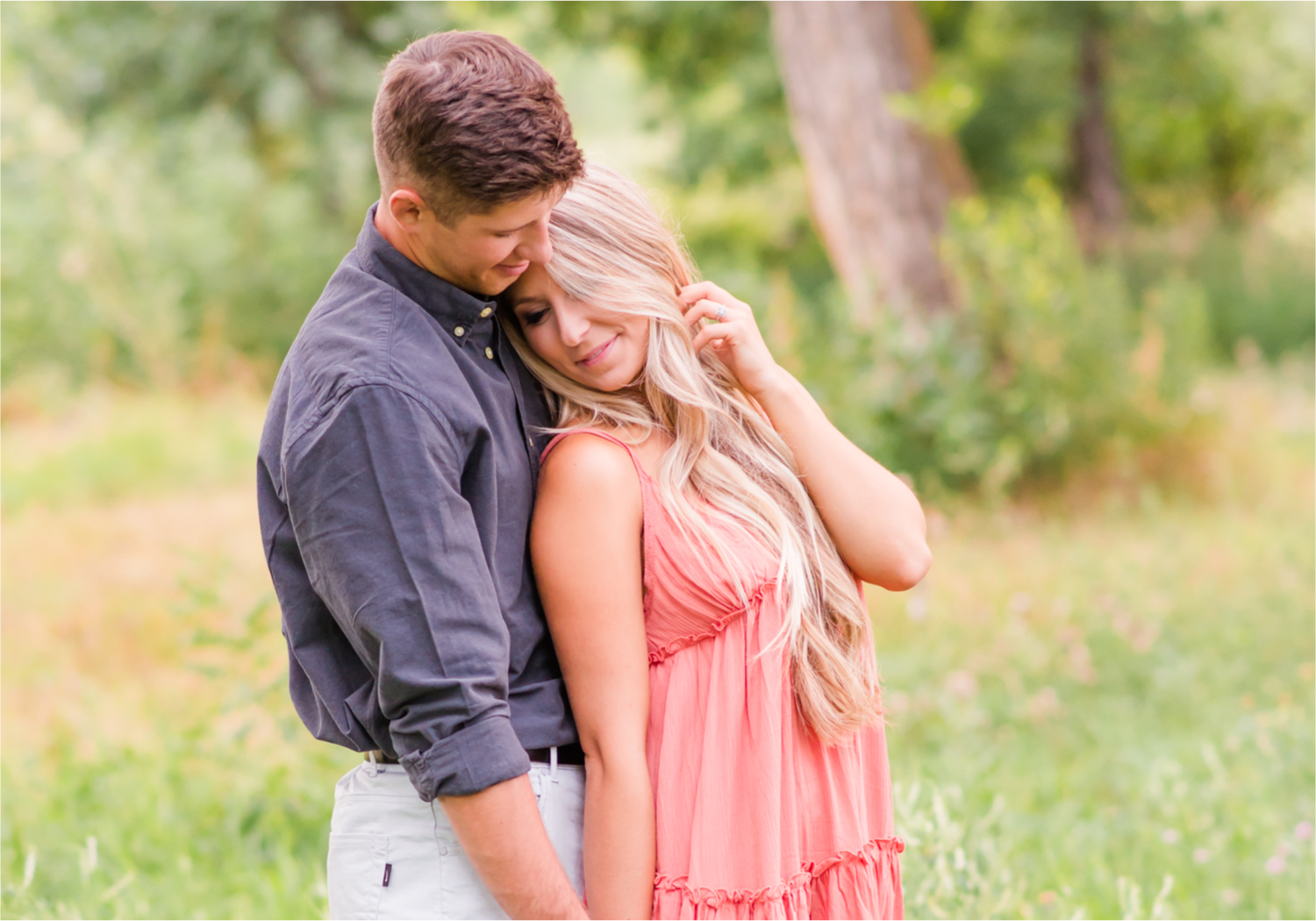 Romantic Winery engagement at Sweet Heart Winery in Loveland | Britni Girard Photography, Colorado Wedding Photographer | Strolls along the Big Thompson River at Sunset, toasting their engagement with Sweet Heart Wine and dancing in the field during sunset