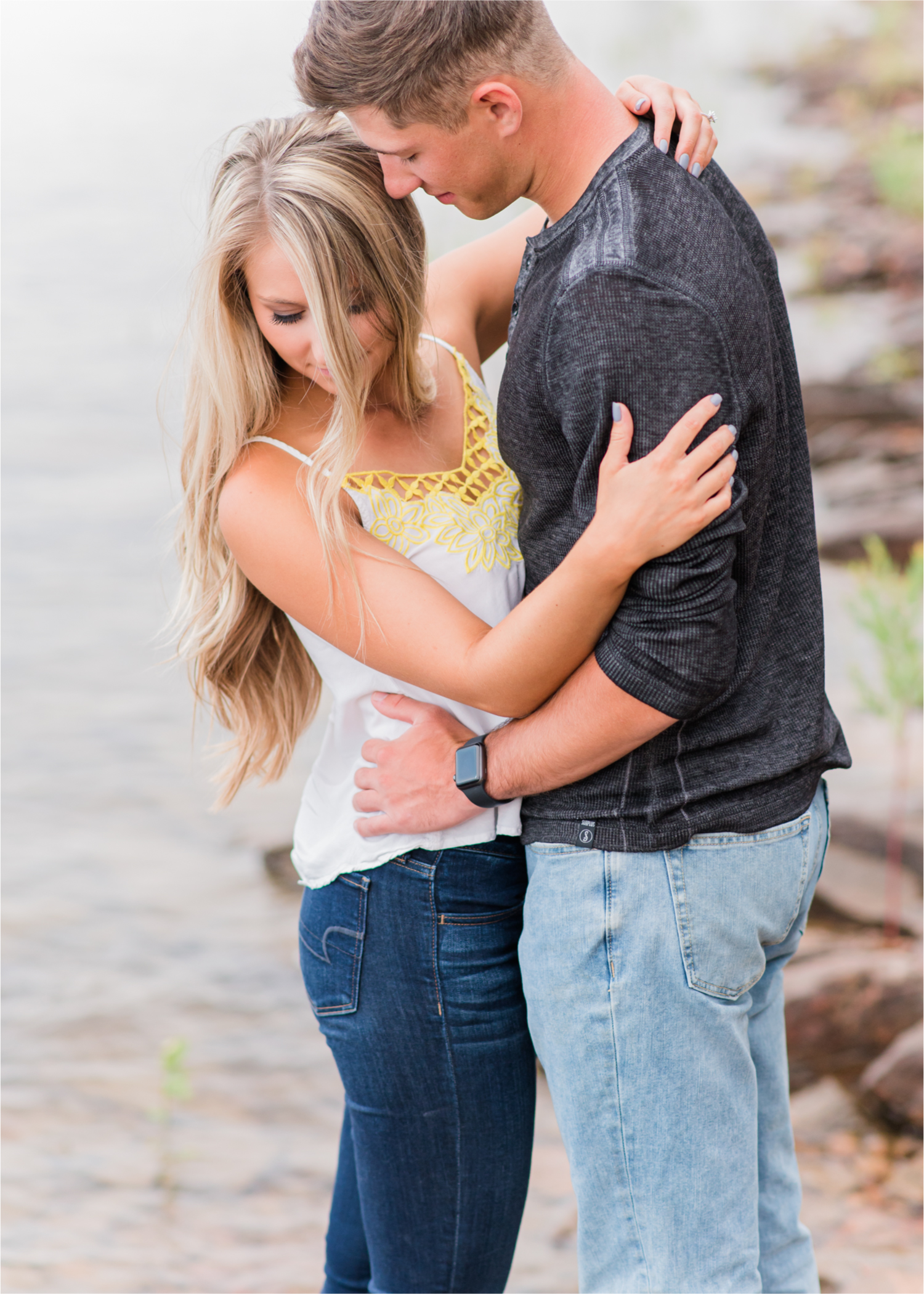 Romantic Summer engagement Lakeside at Carter Lake | Britni Girard Photography, Colorado Wedding Photographer | Walks down by the water and dancing on the dock during casual engagement in Loveland Colorado