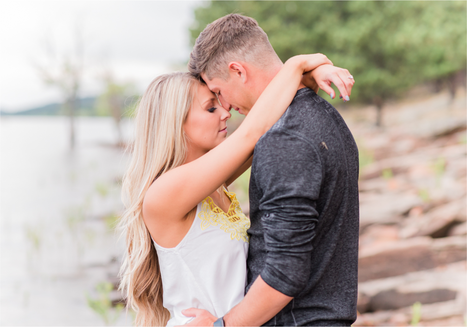 Romantic Summer engagement Lakeside at Carter Lake | Britni Girard Photography, Colorado Wedding Photographer | Walks down by the water and dancing on the dock during casual engagement in Loveland Colorado