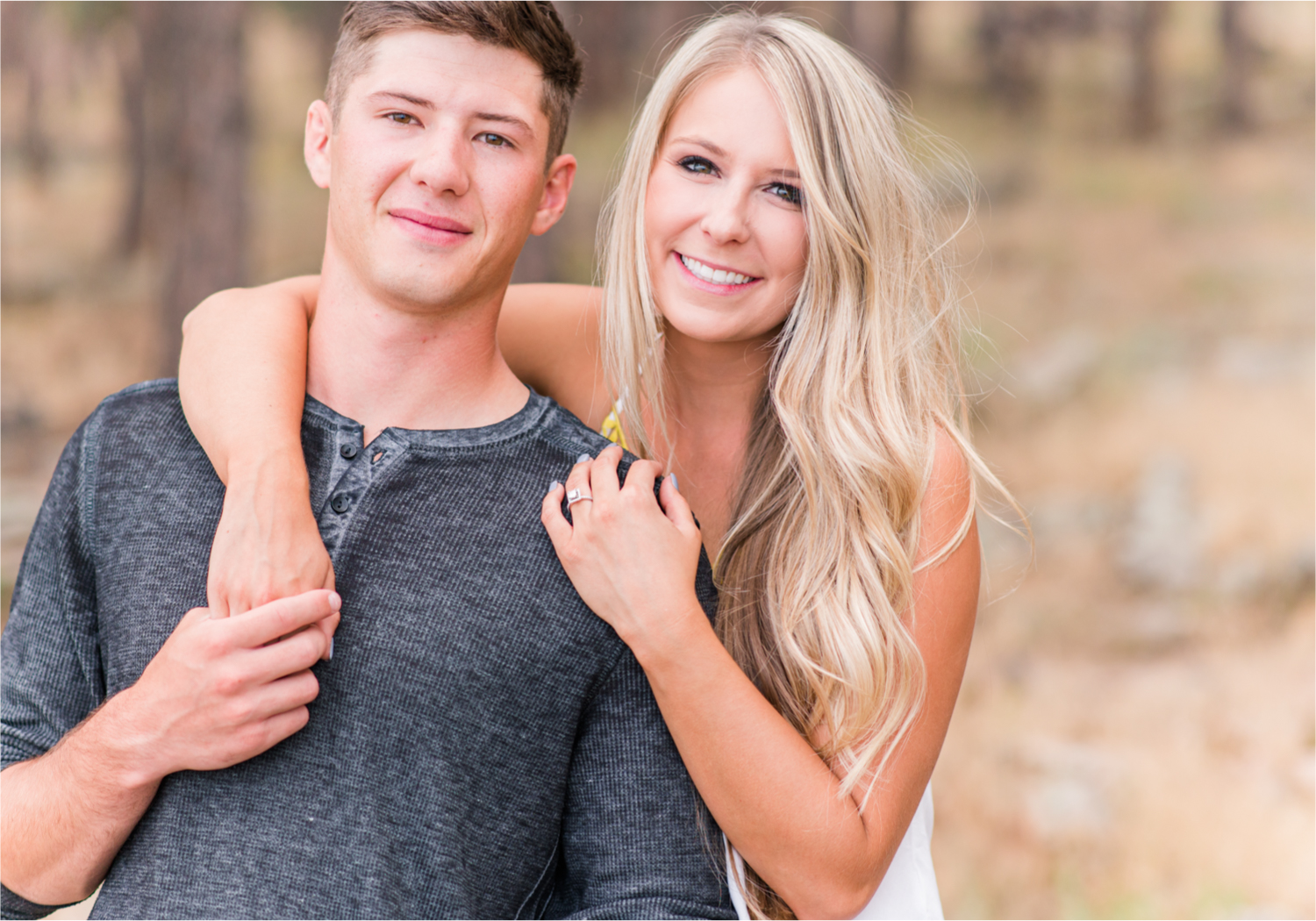 Romantic Summer engagement Lakeside at Carter Lake | Britni Girard Photography, Colorado Wedding Photographer | Walks down by the water and dancing on the dock during casual engagement in Loveland Colorado