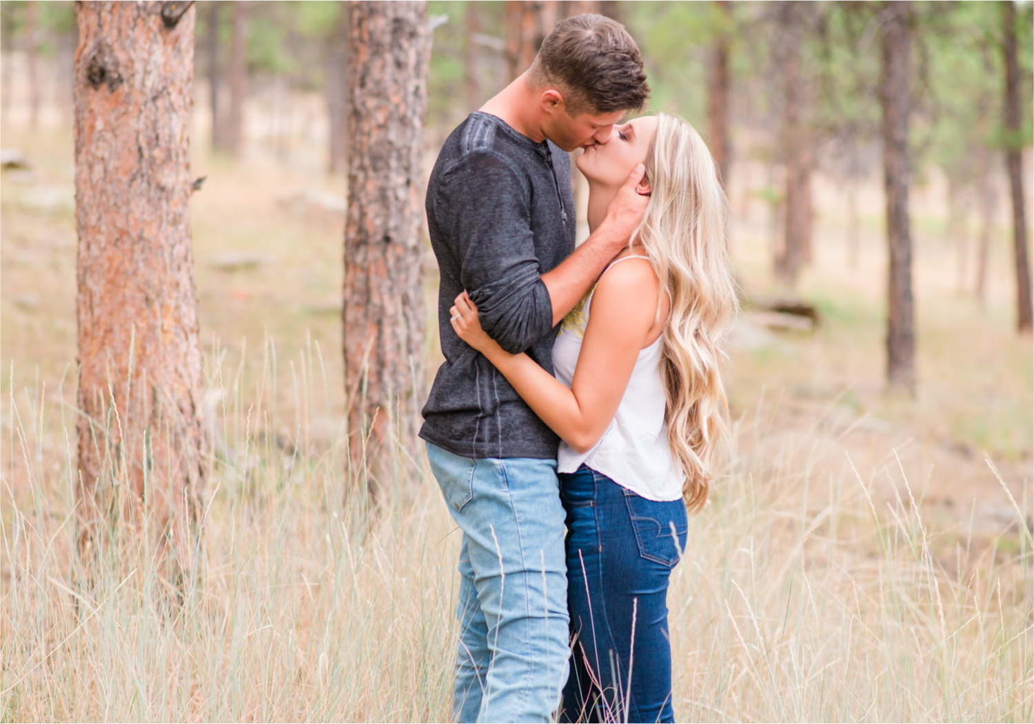 Romantic Summer engagement Lakeside at Carter Lake | Britni Girard Photography, Colorado Wedding Photographer | Walks down by the water and dancing on the dock during casual engagement in Loveland Colorado
