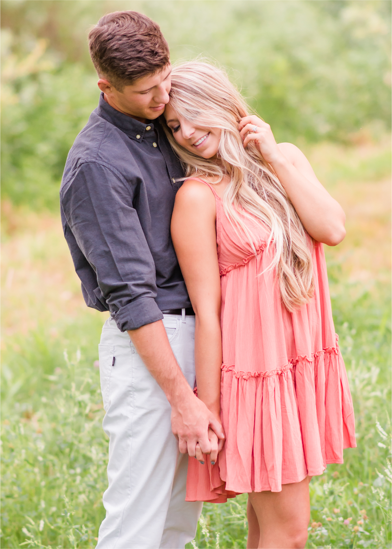 Romantic Winery engagement at Sweet Heart Winery in Loveland  | Britni Girard Photography, Colorado Wedding Photographer | Strolls along the Big Thompson River at Sunset, toasting their engagement with Sweet Heart Wine and dancing in the field during sunset