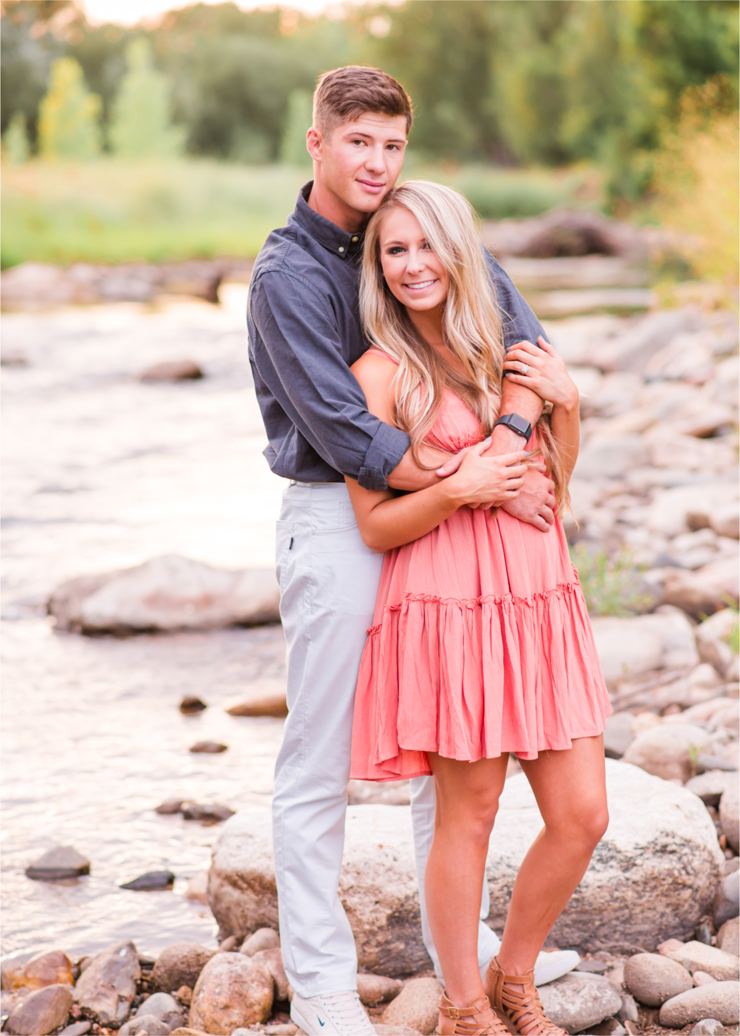 Romantic Winery engagement at Sweet Heart Winery in Loveland  | Britni Girard Photography, Colorado Wedding Photographer | Strolls along the Big Thompson River at Sunset, toasting their engagement with Sweet Heart Wine and dancing in the field during sunset