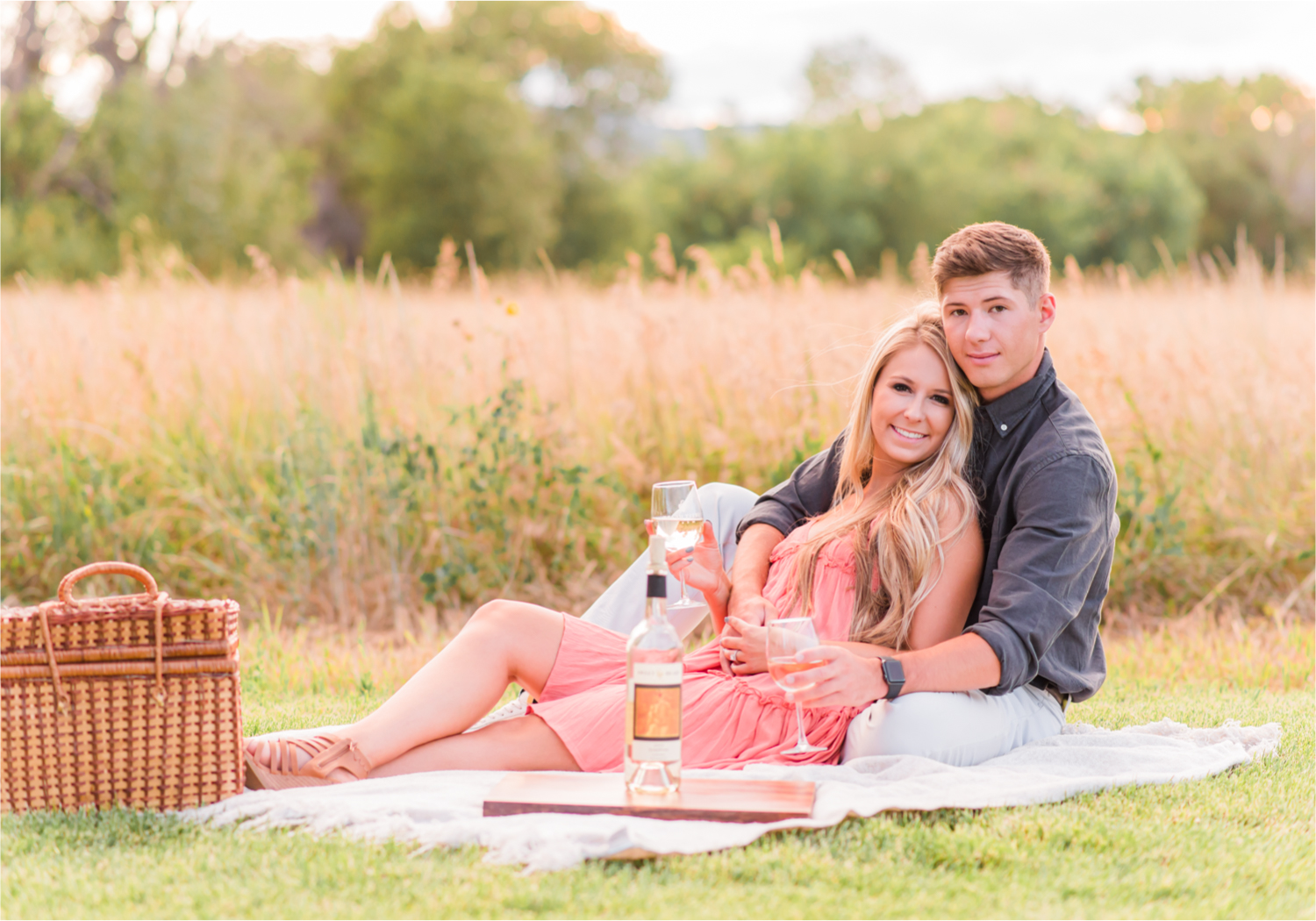 Romantic Winery engagement at Sweet Heart Winery in Loveland  | Britni Girard Photography, Colorado Wedding Photographer | Strolls along the Big Thompson River at Sunset, toasting their engagement with Sweet Heart Wine and dancing in the field during sunset