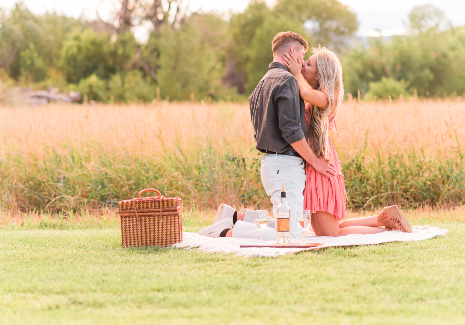Romantic Winery engagement at Sweet Heart Winery in Loveland  | Britni Girard Photography, Colorado Wedding Photographer | Strolls along the Big Thompson River at Sunset, toasting their engagement with Sweet Heart Wine and dancing in the field during sunset