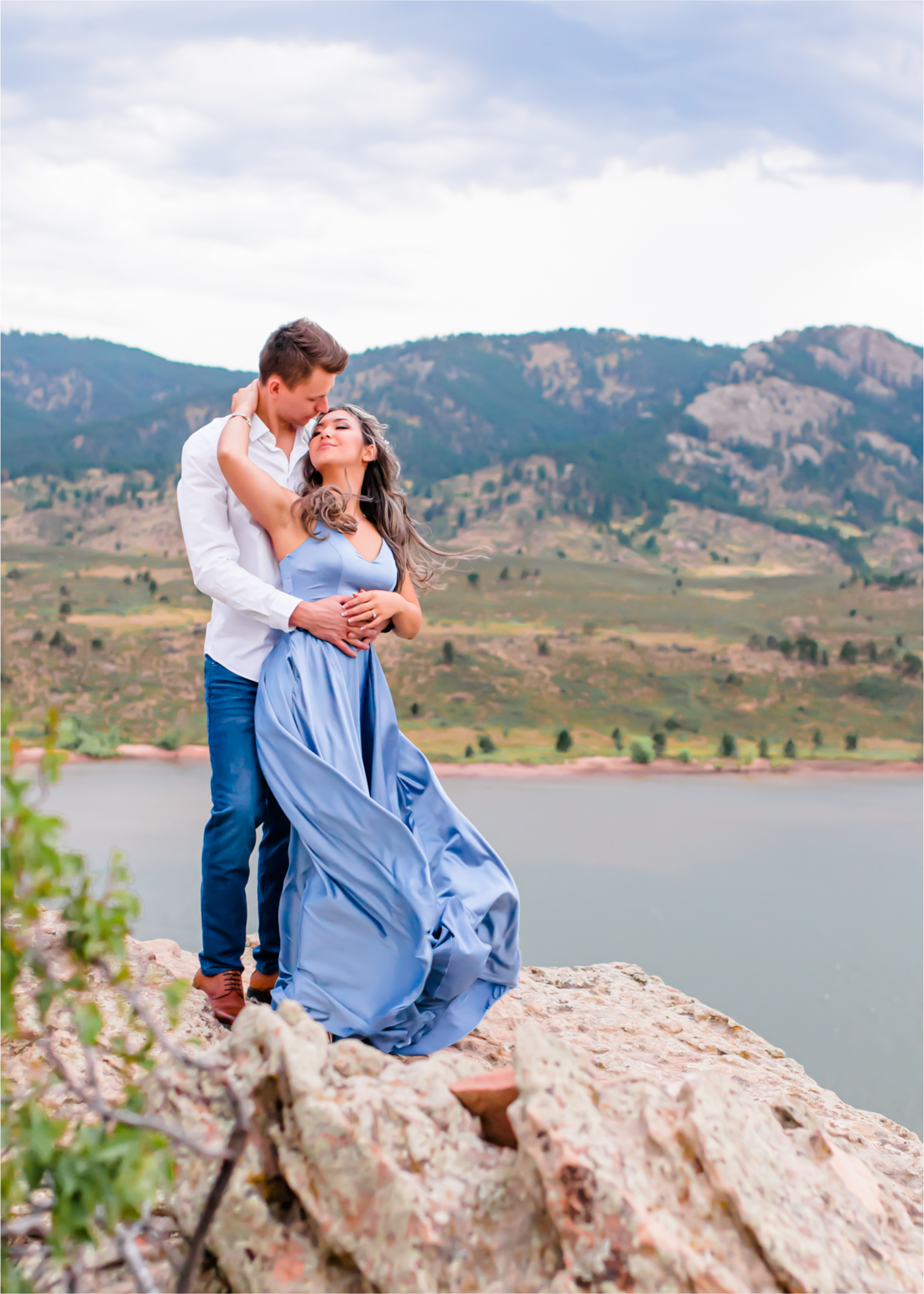 Romantic and Playful Summer engagement session at Horsetooth Reservoir in Fort Collins Colorado | Britni Girard Photographer | Wedding photographer and videographer team | Stormy and Windy Engagement on the cliffs of Horsetooth | Rotary Park