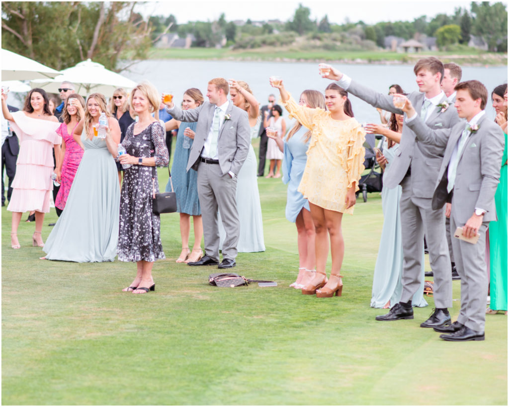 Elegant wedding at Cheyenne Mountain Resort | Britni Girard Photography | Colorado Wedding Photo and Video Team | Just married toast on the chipping green | Dress from Brickhouse Bridal in Houston | Grooms Suit from Generation Tux