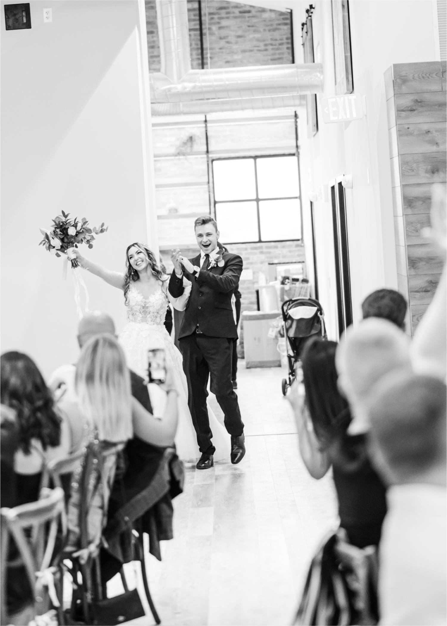 Romantic and Rustic Wedding at The Mill in Windsor | Britni Girard Photography | Colorado based wedding photography and videography team | Bride and groom entrance to reception