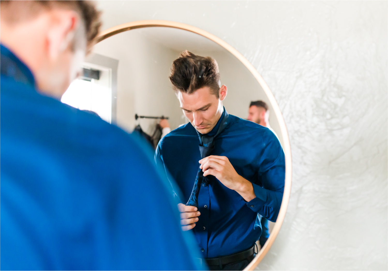 Romantic and Rustic Wedding at The Mill in Windsor | Britni Girard Photography | Colorado based wedding photography and videography team | Groom portraits | Royal Blue and White Wedding | Groomsmen attire from Express
