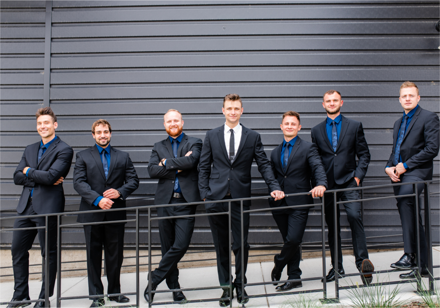 Romantic and Rustic Wedding at The Mill in Windsor | Britni Girard Photography | Colorado based wedding photography and videography team | Groomsmen outside The Windsor Mill | Royal Blue and White Wedding | Groomsmen attire from Express