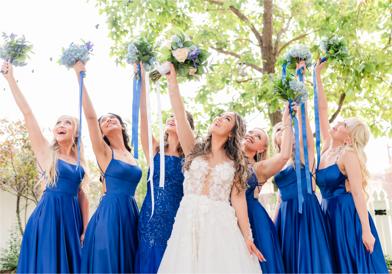 Romantic and Rustic Wedding at The Mill in Windsor | Britni Girard Photography | Colorado based wedding photography and videography team | Royal Blue and White Bridesmaids