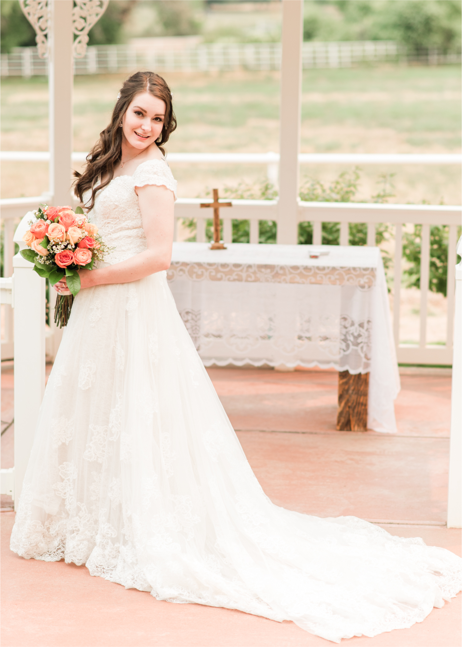 Summer Ellis Ranch Wedding in Loveland Colorado | Britni Girard Photography | Wedding Photo and Video Team | Bride hair Dondi AtWow from Sola Salon in Loveland | Floral hair crystals | Bridal Portraits | Orange Bouquet | Gazebo Bridal Portraits