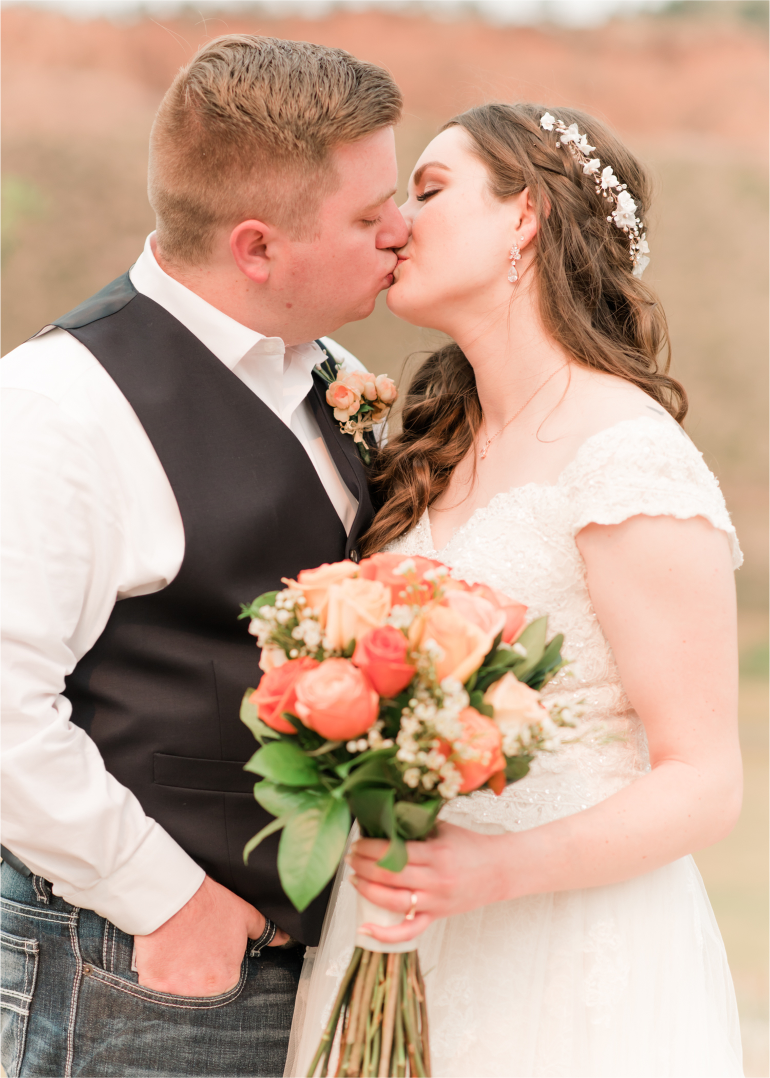 Summer Ellis Ranch Wedding in Loveland Colorado | Britni Girard Photography | Wedding Photo and Video Team | Dark Blue and Orange Bridal Bouquet