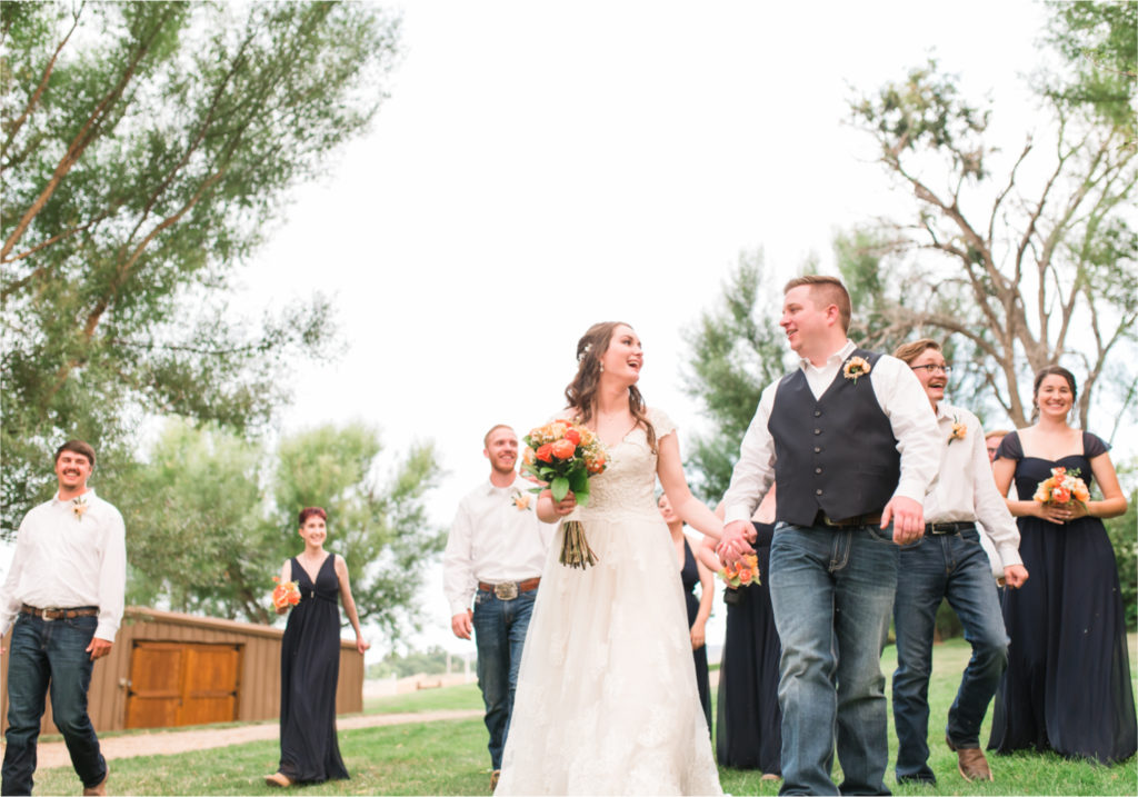Summer Ellis Ranch Wedding in Loveland Colorado | Britni Girard Photography | Wedding Photo and Video Team | Dark Blue and Orange Bridesmaids