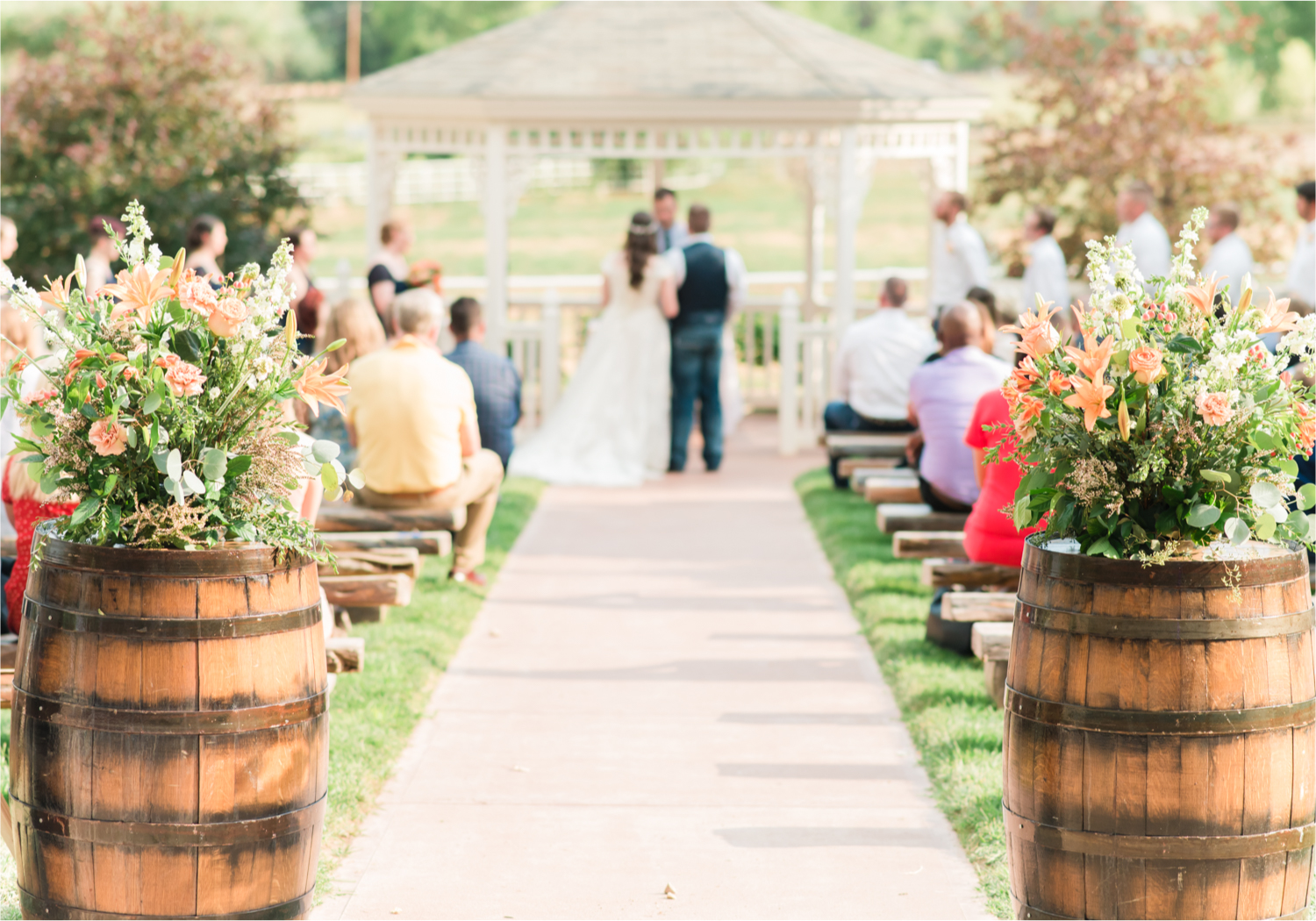 Summer Ellis Ranch Wedding in Loveland Colorado | Britni Girard Photography | Wedding Photo and Video Team | Gazebo Ceremony on Rustic Colorado Ranch - Whiskey Barrel wedding florals