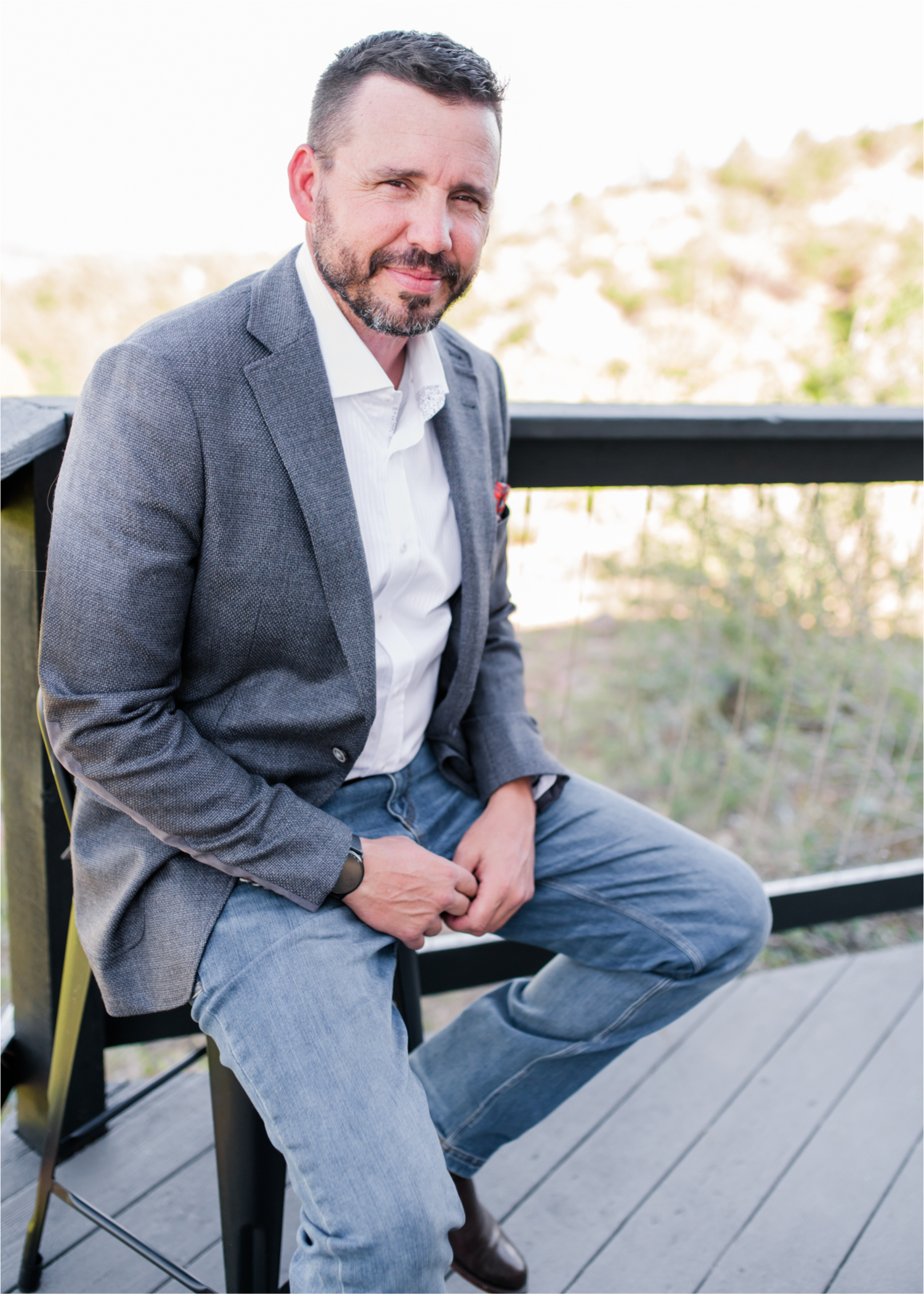 Autumn mountain wedding in Florence Colorado | Britni Girard Photography | Colorado Wedding Photo and Video Team | Mountainside Cabin for intimate wedding with rustic farm-tables and romantic details | Wedding Colors White, Dusty Rose and Sage | Groom Portraits overlooking mountains