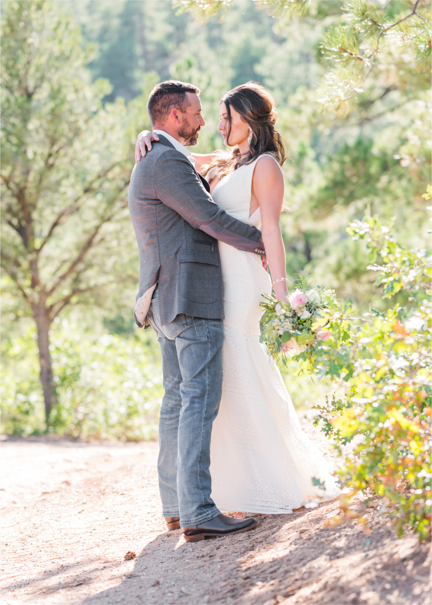 Autumn mountain wedding in Florence Colorado | Britni Girard Photography | Colorado Wedding Photo and Video Team | Mountainside Cabin for intimate wedding with rustic farm-tables and romantic details | Wedding Colors White, Dusty Rose and Sage | Florals by Skyway Creations  | Bride and Groom Portraits in the Mountains