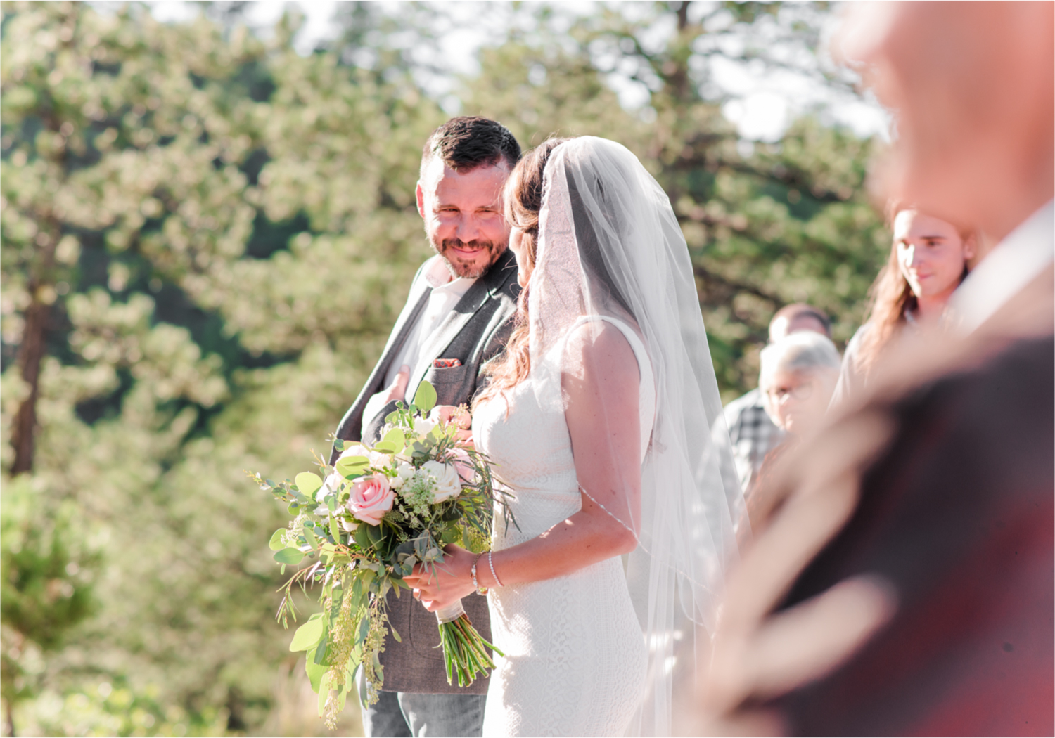 Autumn mountain wedding in Florence Colorado | Britni Girard Photography | Colorado Wedding Photo and Video Team | Mountainside Cabin for intimate wedding with rustic farm-tables and romantic details | Wedding Colors White, Dusty Rose and Sage | Catering by The Picnic Basket | Florals by Skyway Creations | Rocky Mountain Beverage Burro