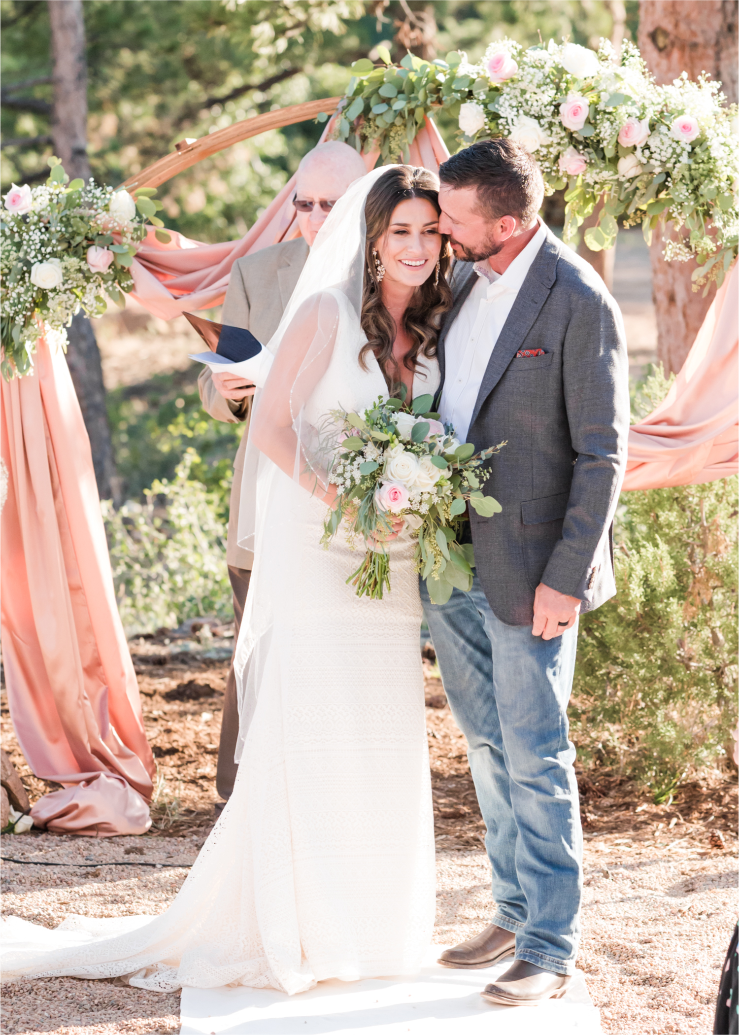 Autumn mountain wedding in Florence Colorado | Britni Girard Photography | Colorado Wedding Photo and Video Team | Mountainside Cabin for intimate wedding with rustic farm-tables and romantic details | Wedding Colors White, Dusty Rose and Sage | Catering by The Picnic Basket | Florals by Skyway Creations | Rocky Mountain Beverage Burro