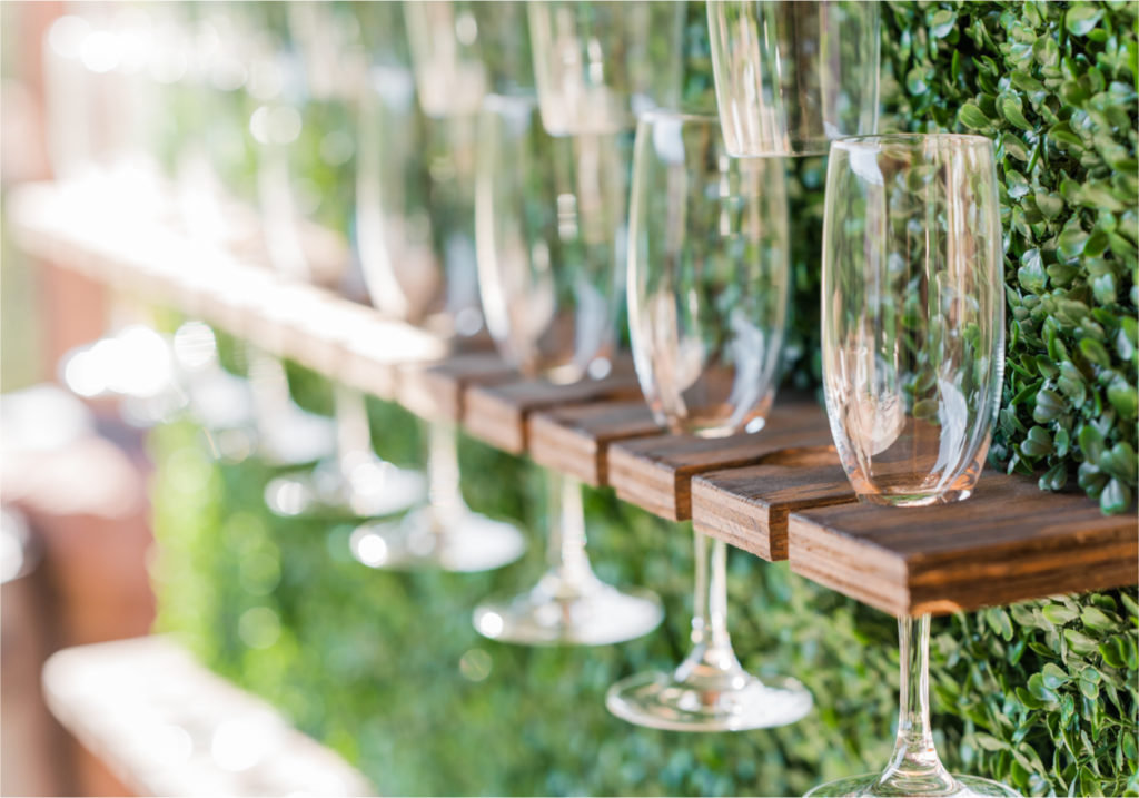 Autumn mountain wedding in Florence Colorado | Britni Girard Photography | Colorado Wedding Photo and Video Team | Mountainside Cabin for intimate wedding with rustic farm-tables and romantic details | Wedding Colors White, Dusty Rose and Sage | Catering by The Picnic Basket | Champagne Toast Wall with Greenery