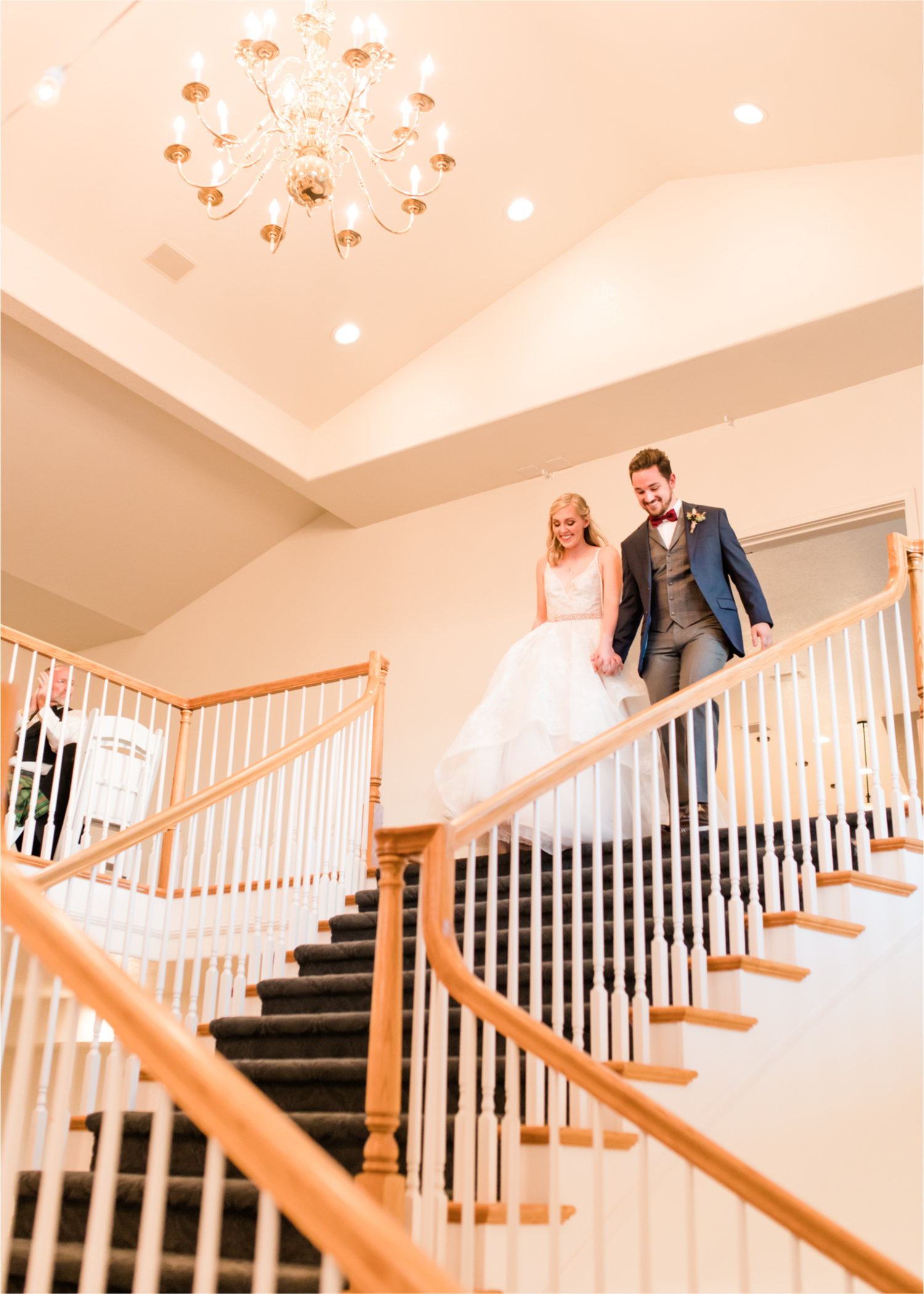 Romantic Whimsical Wedding at the Lionscrest Manor in Lyons, CO | Britni Girard Photography - Wedding Photo and Video Team | Rustic Fall Decor mixed in Burgundy, Blush, Gold and Sage | Wedding Dress from Anna Be Bridal by Hailey Paige | Hair and Makeup by Glam 5280 Chaundra Revier | Florals by Aflorae | Reception in Manor Ballroom | Bride and Groom Staircase grande entrance
