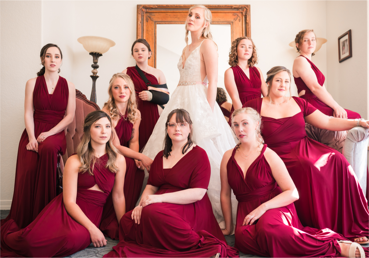 Romantic Whimsical Wedding at the Lionscrest Manor in Lyons, CO | Britni Girard Photography - Wedding Photo and Video Team | Rustic Fall Decor mixed in Burgundy, Blush, Gold and Sage | Wedding Dress from Anna Be Bridal by Hailey Paige | Hair and Makeup by Glam 5280 Chaundra Revier | Bridesmaids getting ready in Burgundy wrap dresses