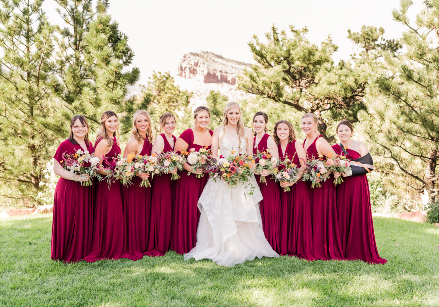 Romantic Whimsical Wedding at the Lionscrest Manor in Lyons, CO | Britni Girard Photography - Wedding Photo and Video Team | Rustic Fall Decor mixed in Burgundy, Blush, Gold and Sage | Wedding Dress from Anna Be Bridal by Hailey Paige | Hair and Makeup by Glam 5280 Chaundra Revier | Bride and Bridesmaids | Florals by Aflorae