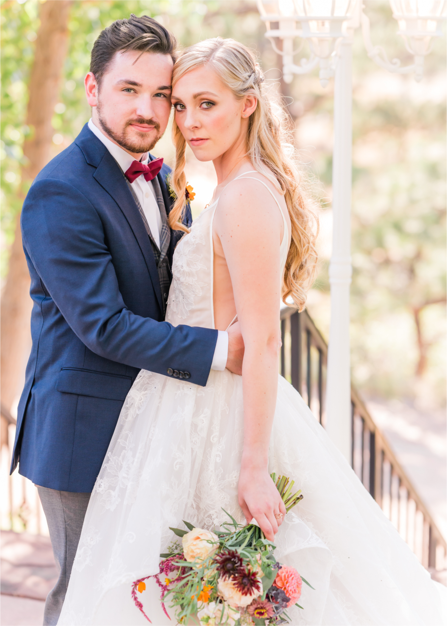 Romantic Whimsical Wedding at the Lionscrest Manor in Lyons, CO | Britni Girard Photography - Wedding Photo and Video Team | Rustic Fall Decor mixed in Burgundy, Blush, Gold and Sage | Groom in Custom Suit from Jos. a Banks | Romantic Bride and Groom Portraits in the rocky mountains | Wedding Dress from Anna Be Bridal by Hailey Paige | Hair and Makeup by Glam 5280 Chaundra Revier | Florals by Aflorae