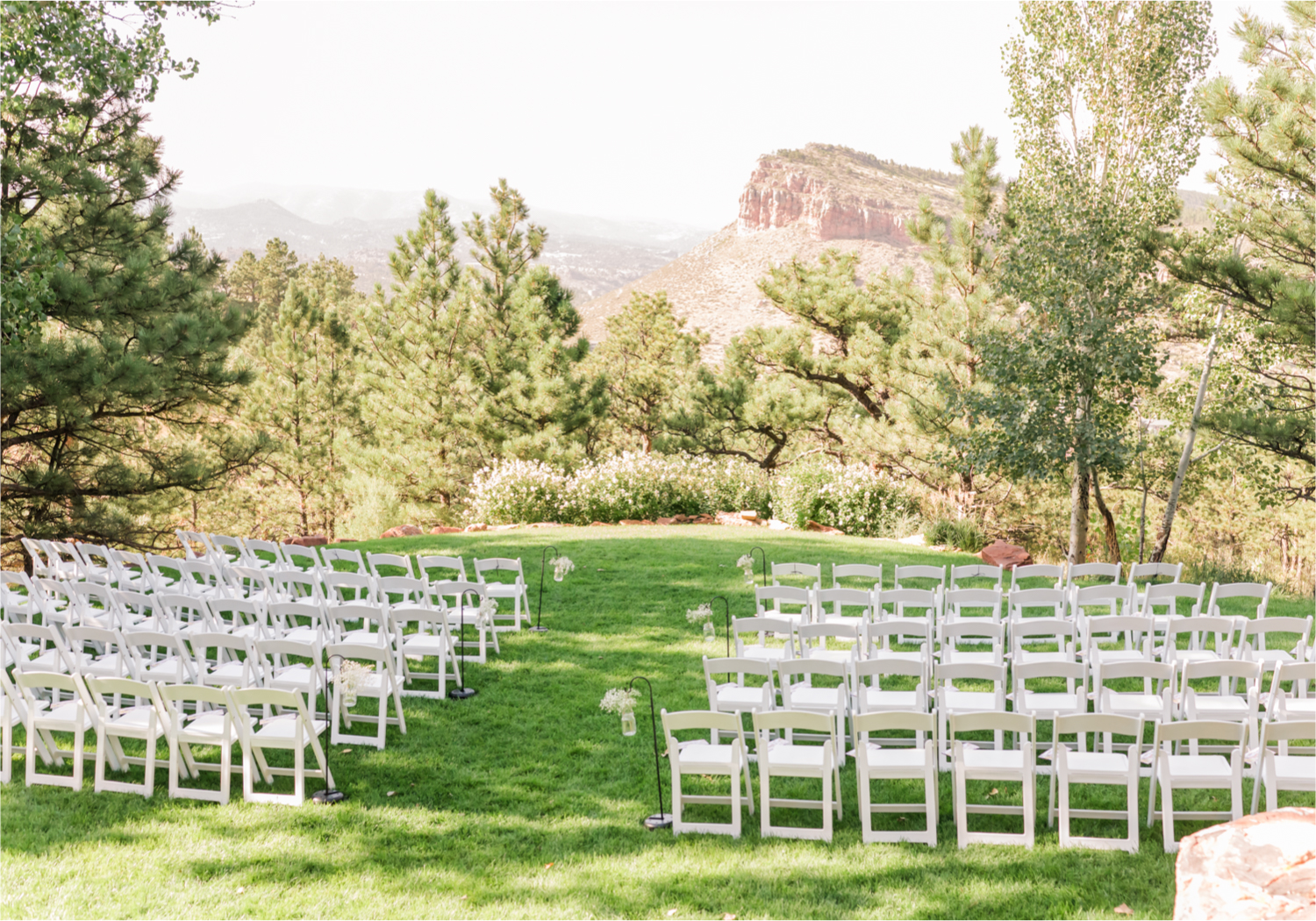 Romantic Whimsical Wedding at the Lionscrest Manor in Lyons, CO | Britni Girard Photography - Wedding Photo and Video Team | Rustic Fall Decor mixed in Burgundy, Blush, Gold and Sage | Wedding Dress from Anna Be Bridal by Hailey Paige | Hair and Makeup by Glam 5280 Chaundra Revier | Florals by Aflorae | Ceremony Site overlooking the Rocky Mountains | Mountaintop Ceremony