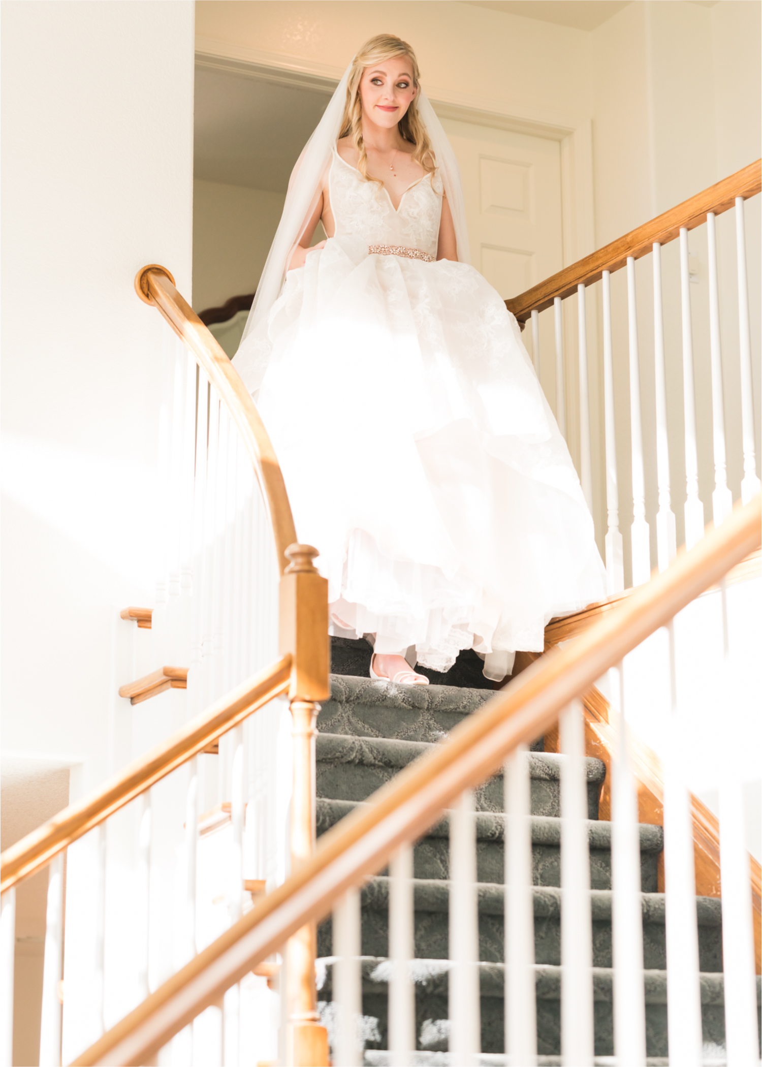 Romantic Whimsical Wedding at the Lionscrest Manor in Lyons, CO | Britni Girard Photography - Wedding Photo and Video Team | Rustic Fall Decor mixed in Burgundy, Blush, Gold and Sage | Wedding Dress from Anna Be Bridal by Hailey Paige | Hair and Makeup by Glam 5280 Chaundra Revier | Florals by Aflorae | Bride coming down stairs before ceremony