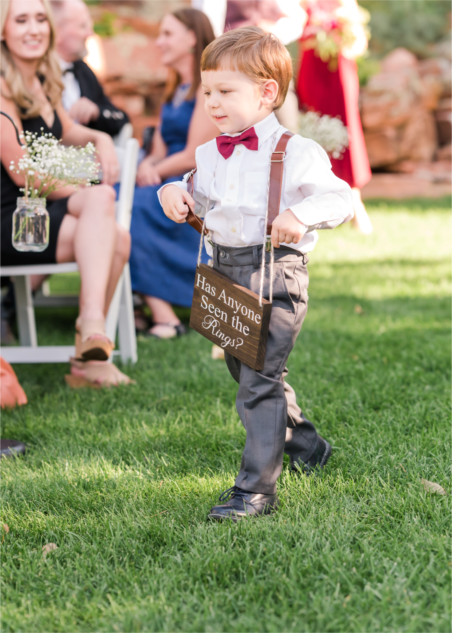 Romantic Whimsical Wedding at the Lionscrest Manor in Lyons, CO | Britni Girard Photography - Wedding Photo and Video Team | Rustic Fall Decor mixed in Burgundy, Blush, Gold and Sage | Wedding Dress from Anna Be Bridal by Hailey Paige | Hair and Makeup by Glam 5280 Chaundra Revier | Florals by Aflorae | Ceremony Site overlooking the Rocky Mountains | Mountaintop Ceremony | Funny Ring Bearer Sign