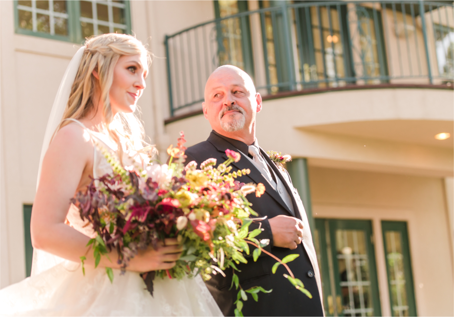 Romantic Whimsical Wedding at the Lionscrest Manor in Lyons, CO | Britni Girard Photography - Wedding Photo and Video Team | Rustic Fall Decor mixed in Burgundy, Blush, Gold and Sage | Wedding Dress from Anna Be Bridal by Hailey Paige | Hair and Makeup by Glam 5280 Chaundra Revier | Florals by Aflorae | Ceremony Site overlooking the Rocky Mountains | Mountaintop Ceremony | Bride Entrance