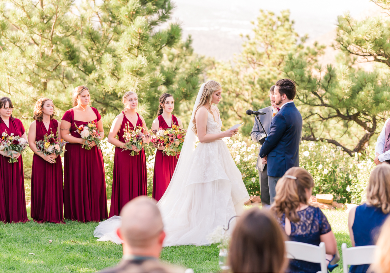 Romantic Whimsical Wedding at the Lionscrest Manor in Lyons, CO | Britni Girard Photography - Wedding Photo and Video Team | Rustic Fall Decor mixed in Burgundy, Blush, Gold and Sage | Wedding Dress from Anna Be Bridal by Hailey Paige | Hair and Makeup by Glam 5280 Chaundra Revier | Florals by Aflorae | Ceremony Site overlooking the Rocky Mountains | Mountaintop Ceremony before Sunset