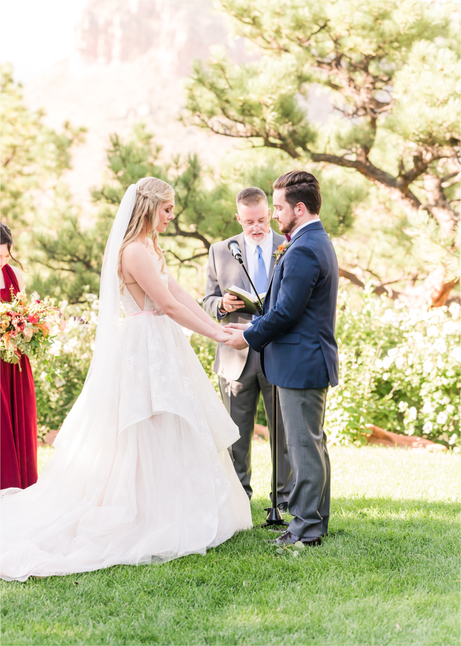Romantic Whimsical Wedding at the Lionscrest Manor in Lyons, CO | Britni Girard Photography - Wedding Photo and Video Team | Rustic Fall Decor mixed in Burgundy, Blush, Gold and Sage | Wedding Dress from Anna Be Bridal by Hailey Paige | Hair and Makeup by Glam 5280 Chaundra Revier | Florals by Aflorae | Ceremony Site overlooking the Rocky Mountains | Mountaintop Ceremony before Sunset