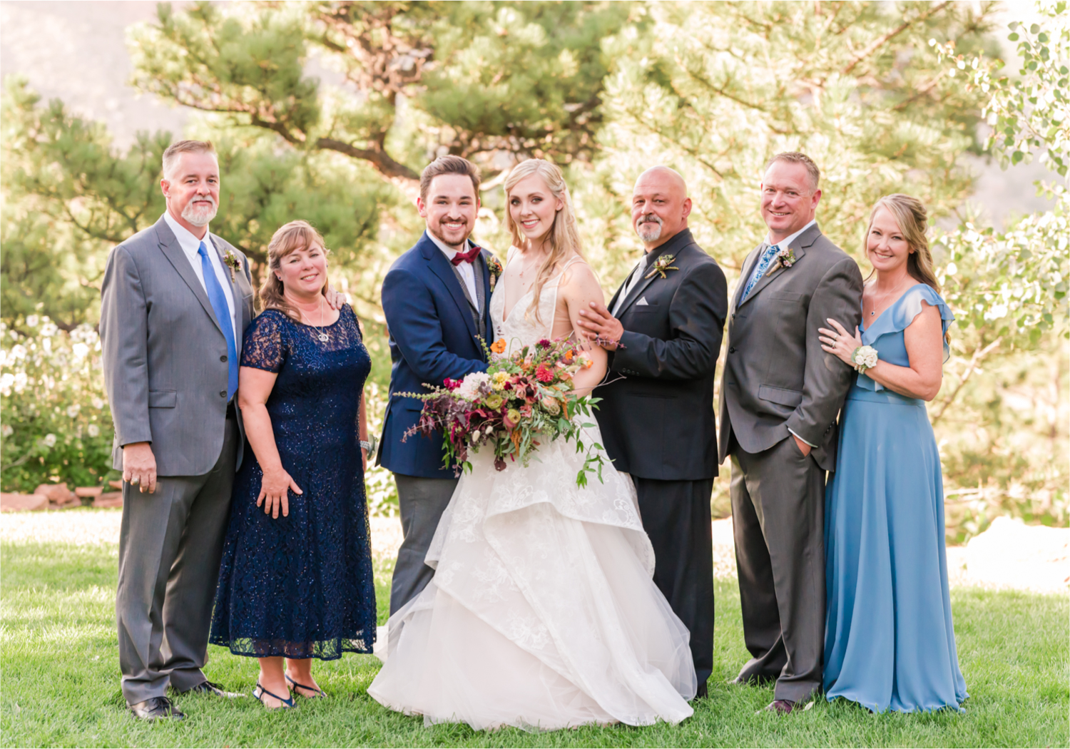 Romantic Whimsical Wedding at the Lionscrest Manor in Lyons, CO | Britni Girard Photography - Wedding Photo and Video Team | Rustic Fall Decor mixed in Burgundy, Blush, Gold and Sage | Wedding Dress from Anna Be Bridal by Hailey Paige | Hair and Makeup by Glam 5280 Chaundra Revier | Florals by Aflorae | Family Formals with all parents
