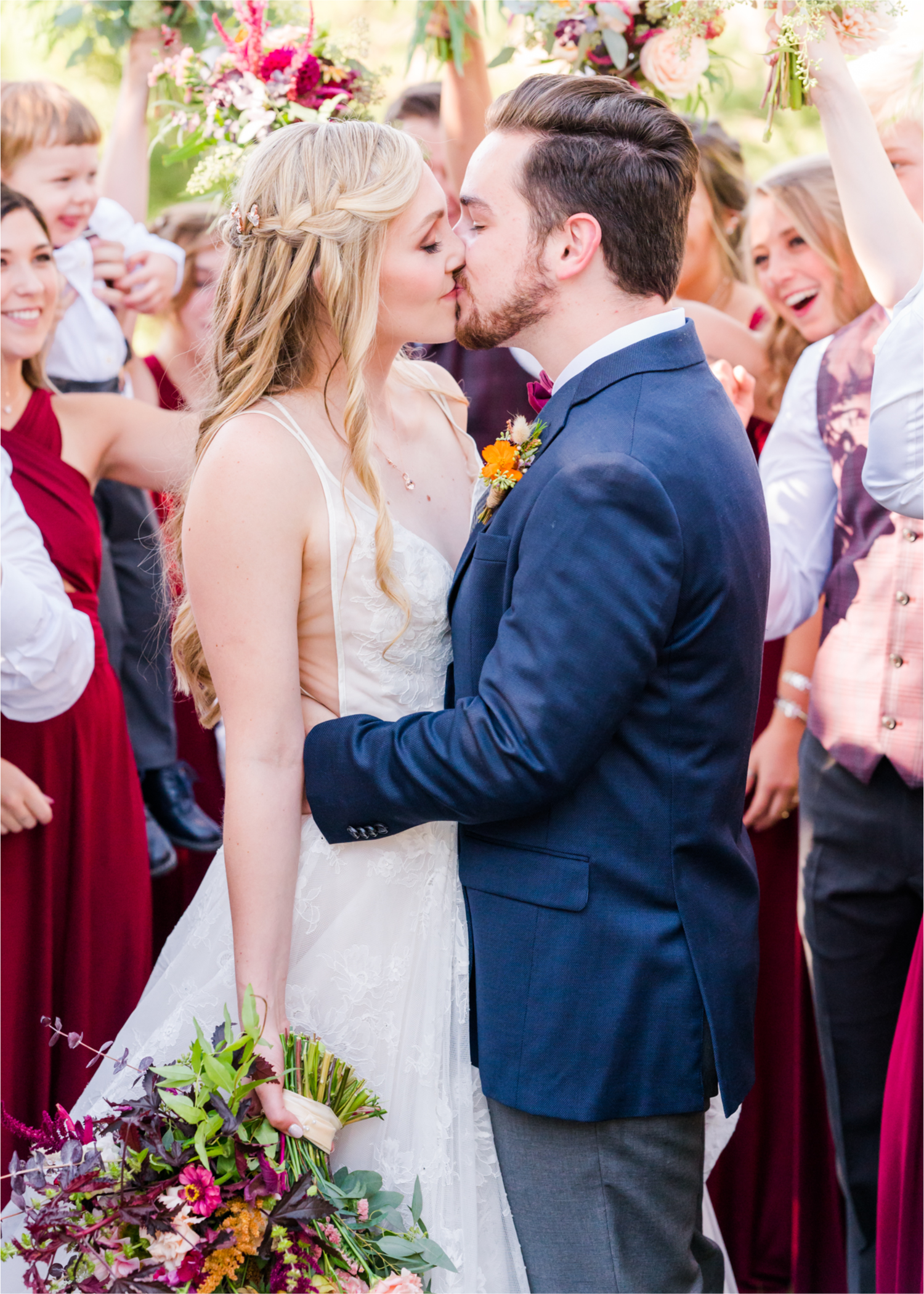 Romantic Whimsical Wedding at the Lionscrest Manor in Lyons, CO | Britni Girard Photography - Wedding Photo and Video Team | Rustic Fall Decor mixed in Burgundy, Blush, Gold and Sage | Large Bridal Party | Groom Custom Suit from Jos. a Banks | Bride Wedding Dress Anna Be Bridal, Hailey Paige | Florals By Aflorae |