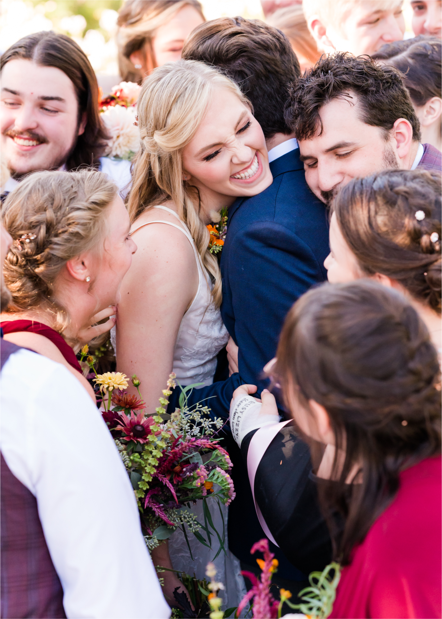 Romantic Whimsical Wedding at the Lionscrest Manor in Lyons, CO | Britni Girard Photography - Wedding Photo and Video Team | Rustic Fall Decor mixed in Burgundy, Blush, Gold and Sage | Large Bridal Party | Groom Custom Suit from Jos. a Banks | Bride Wedding Dress Anna Be Bridal, Hailey Paige | Florals By Aflorae |