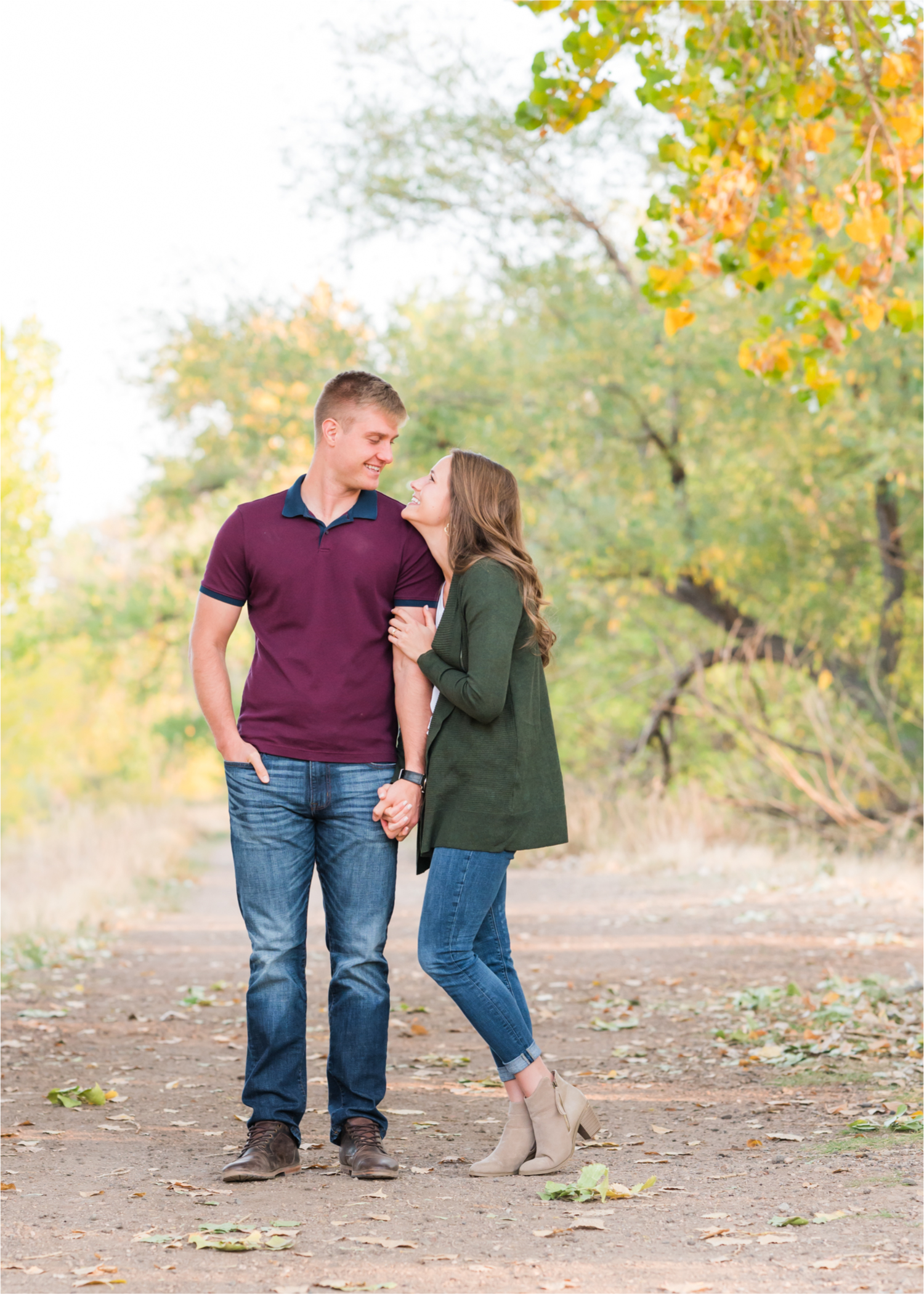 Fall Engagement at Prospect Ponds in Fort Collins | Britni Girard Photography | Colorado Wedding Photography and Videography | Husband and Wife Team | Trails of fall leaves and romantic snuggles under the canopy of color