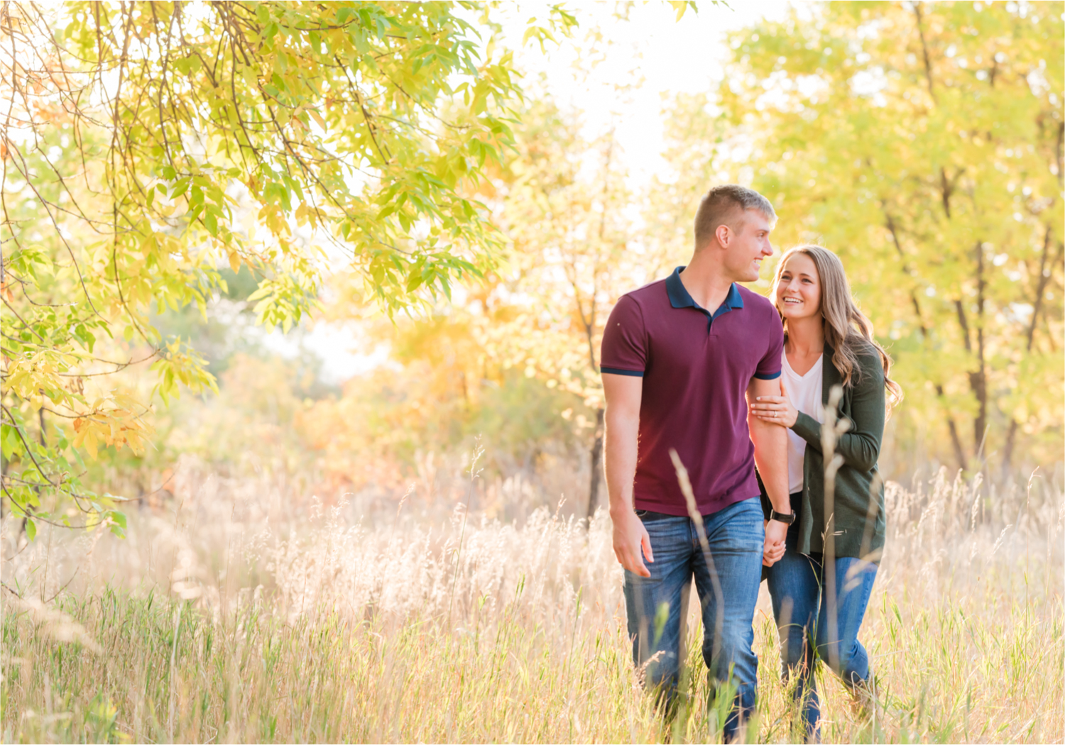 Fall Engagement at Prospect Ponds in Fort Collins | Britni Girard Photography | Colorado Wedding Photography and Videography | Husband and Wife Team | Trails of fall leaves and romantic snuggles under the canopy of color