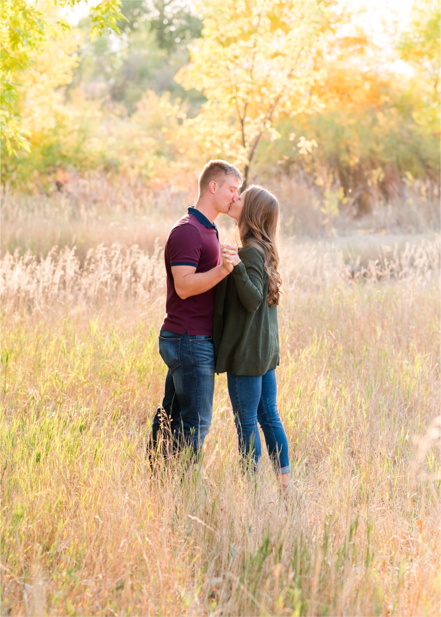 Fall Engagement at Prospect Ponds in Fort Collins | Britni Girard Photography | Colorado Wedding Photography and Videography | Husband and Wife Team | Trails of fall leaves and romantic snuggles under the canopy of color