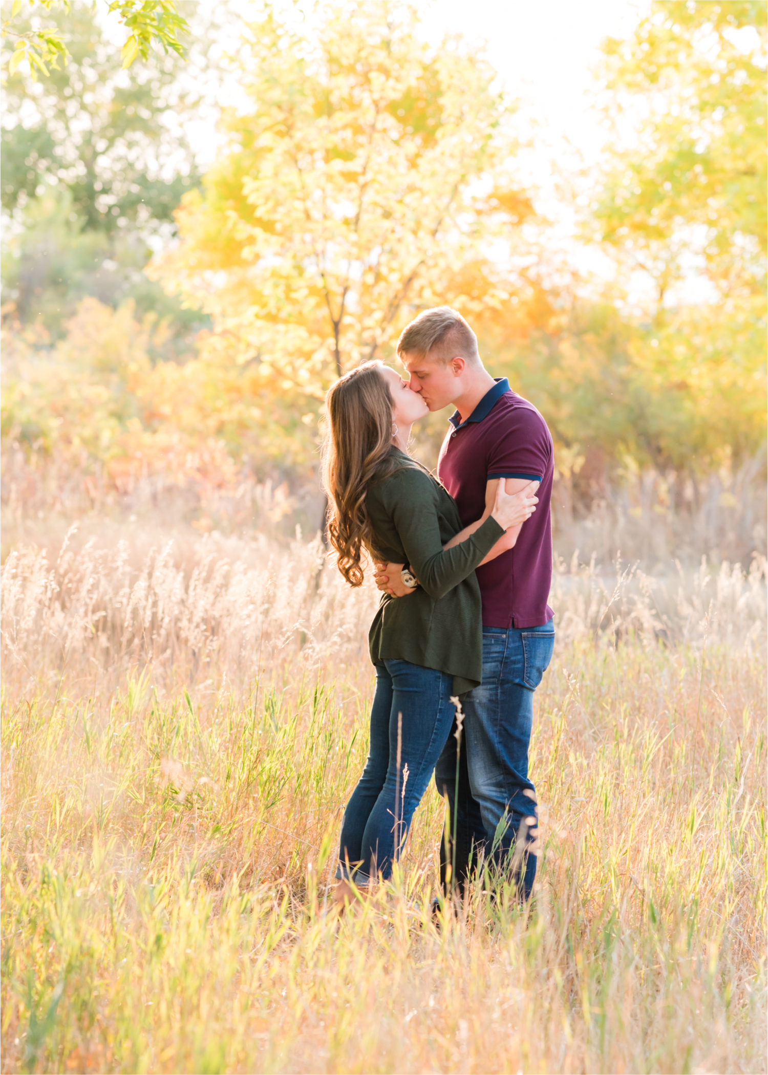 Fall Engagement at Prospect Ponds in Fort Collins | Britni Girard Photography | Colorado Wedding Photography and Videography | Husband and Wife Team | Trails of fall leaves and romantic snuggles under the canopy of color