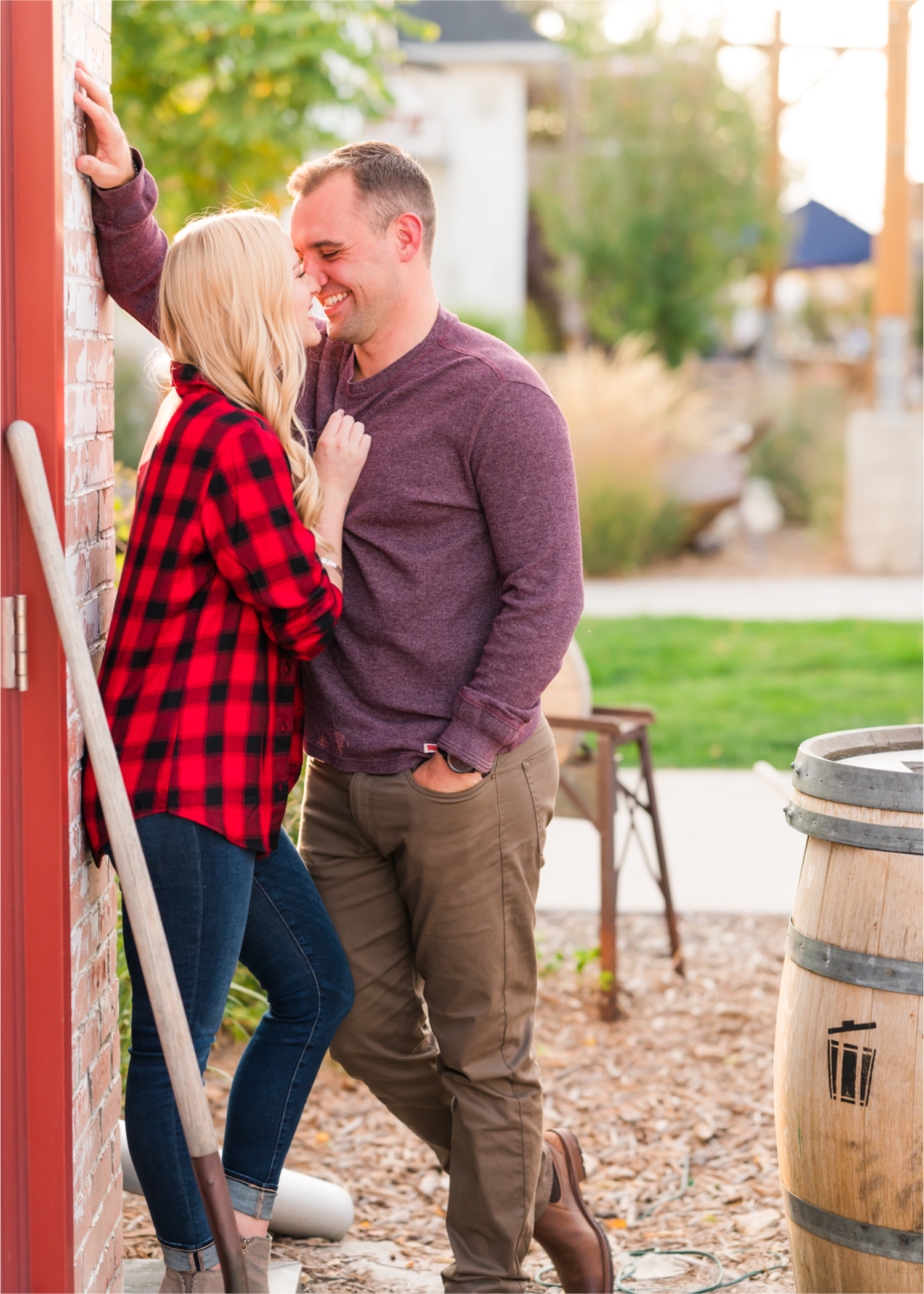 Romantic Fall Farmhouse Engagement at Jessup Farm | Britni Girard Photography | Colorado Wedding Photographer and Videography team | Rustic fences, fall leaves and barn doors in Fort Collins